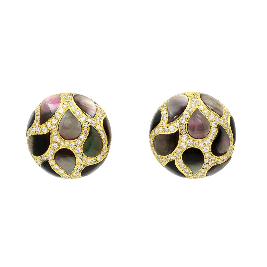 These 18 karat yellow gold round button stud earrings by Gem Veto feature tear shaped mother-of-pearl inlays and are accented with 190 pave diamonds weighing an approximate 2.50 carats combined with GH coloring and VS clarity. The earrings measure