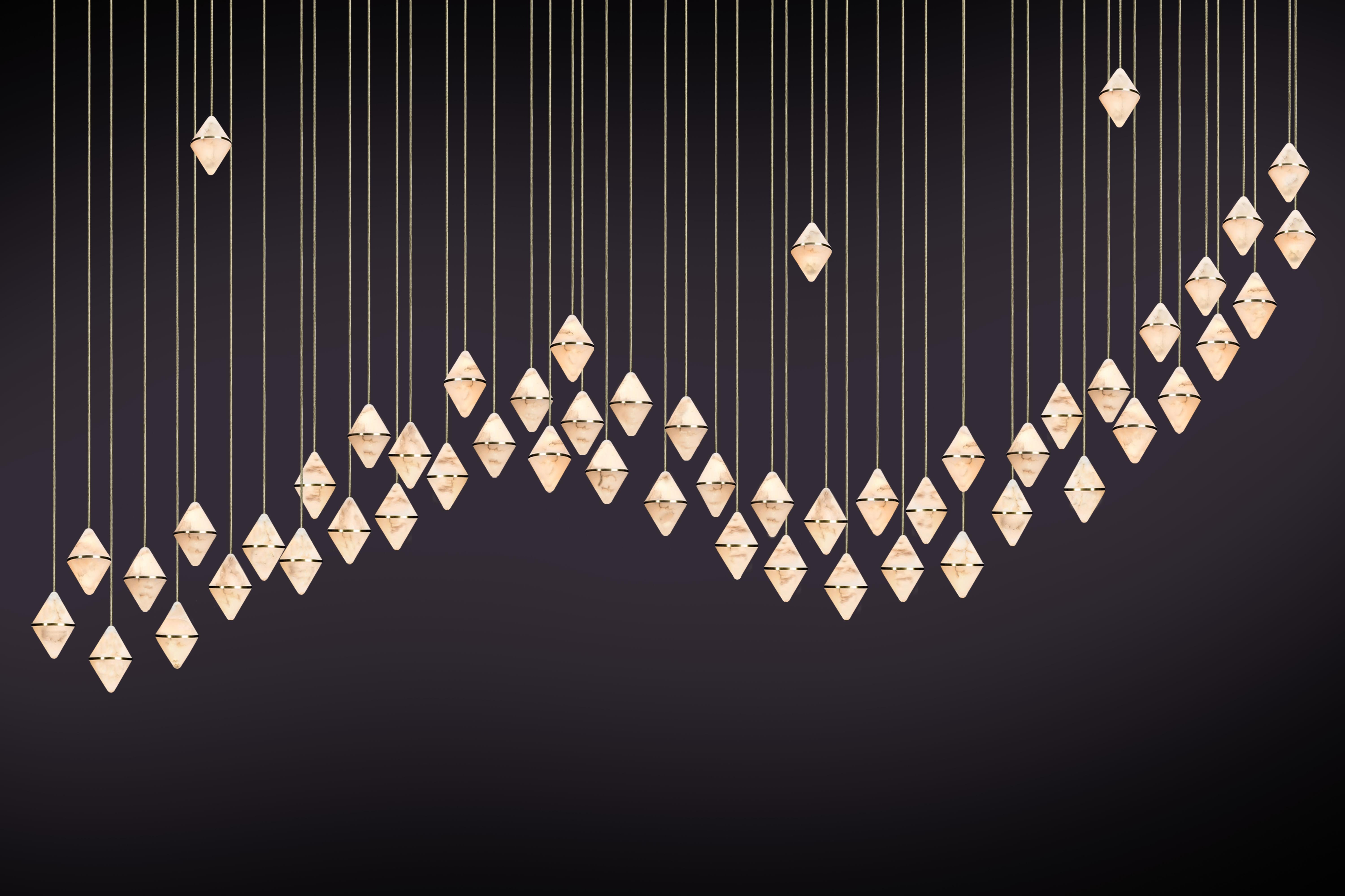 Inspired by the beauty of precious stones and the creativity of the craftspeople who work them. 

Created from alabaster, a material with a long history of use in the visual arts. Loved for its distinct veining and beautiful light-emitting