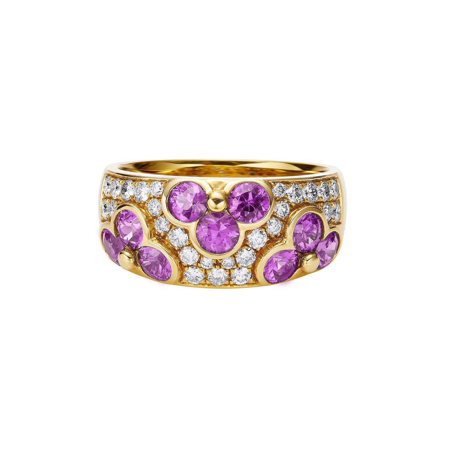 This elegant GEMCOOK 18K Yellow Wide Pink Sapphire Flower Ring boasts a stunning design perfect for any occasion. Its vibrant pink sapphire petals are delicately set on a wide 18K yellow gold band, creating a timeless and luxurious look. Add a touch