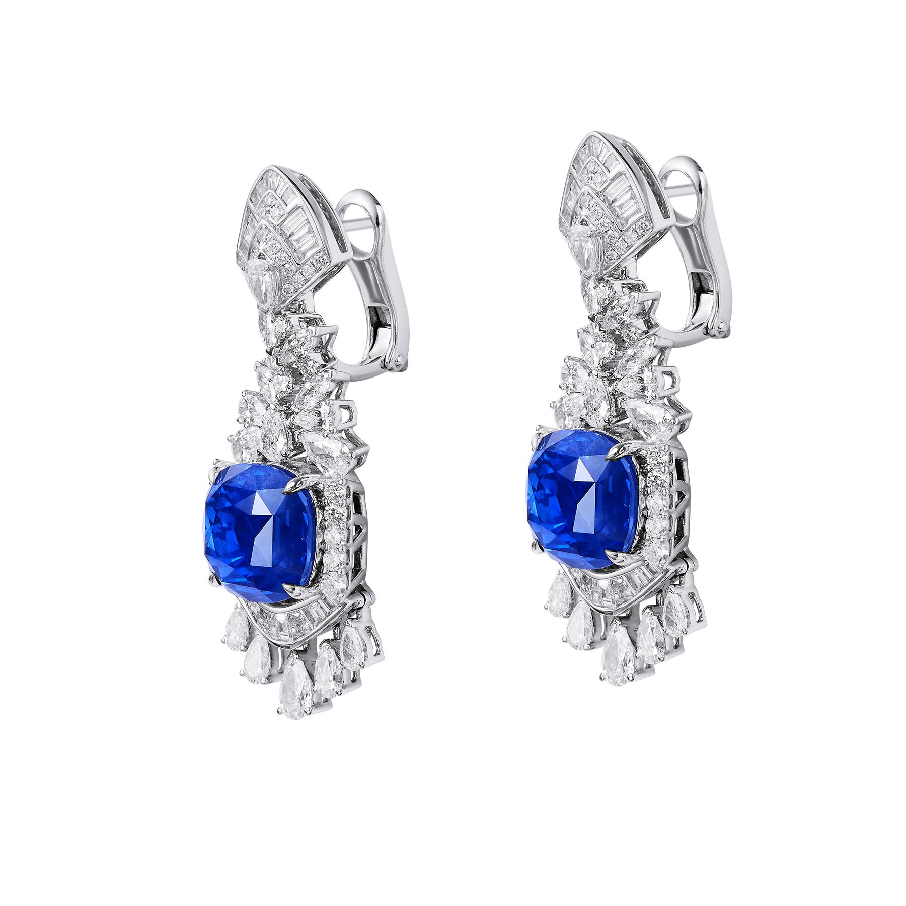 As an expert in the jewellery industry, I'm proud to introduce our GEMCOOK JEWELLERY 15.74ct Royal Blue Earring. These elegant earrings feature a stunning 15.74ct royal blue gemstone, carefully crafted into a timeless design. With its rich color and