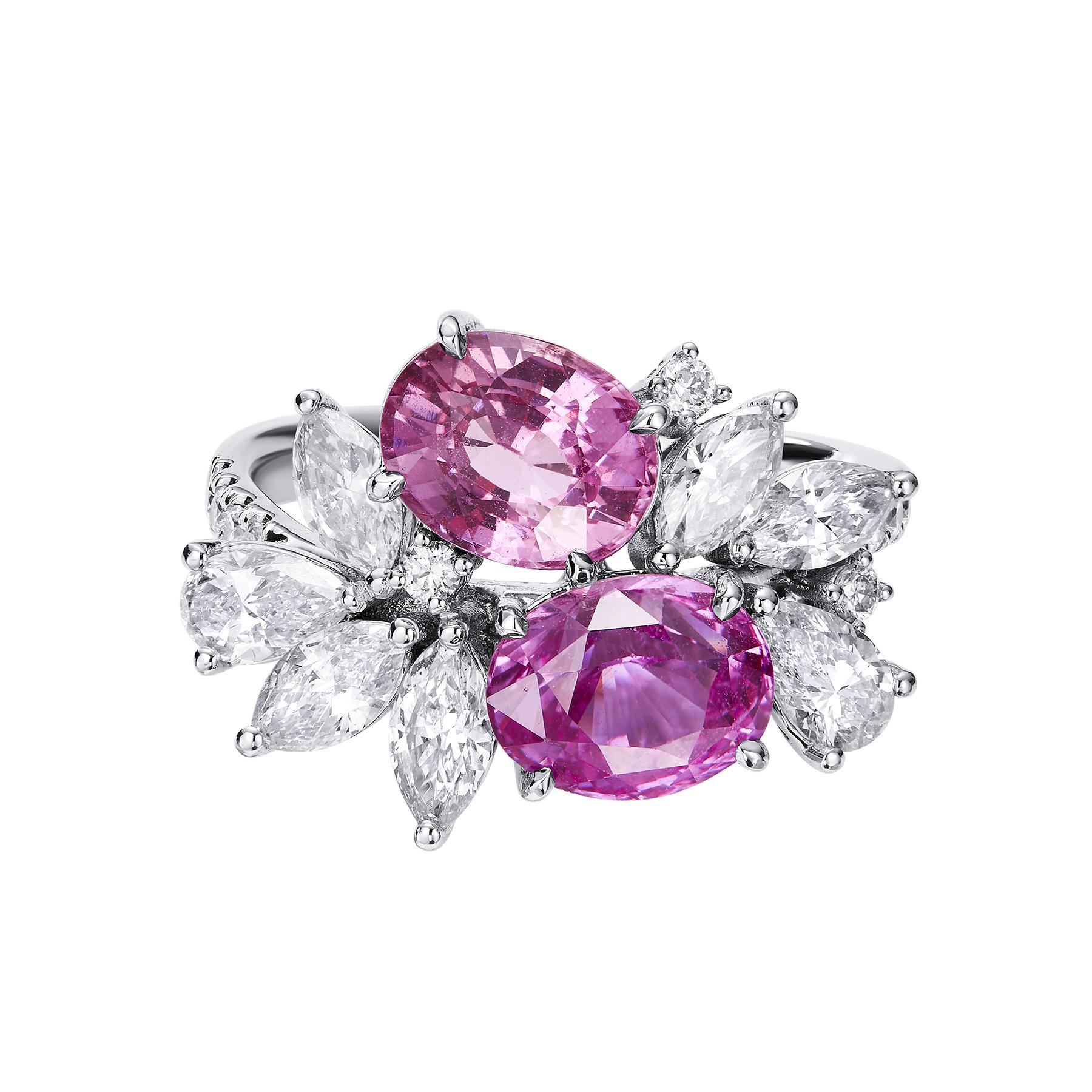 Experience the beauty of a spring garden with GEMCOOK JEWELLERY's Padparadscha Double Stone Ring. Crafted with the utmost attention to detail and the highest quality AIGS loose stones, this ring features a captivating blend of summery dopamine and