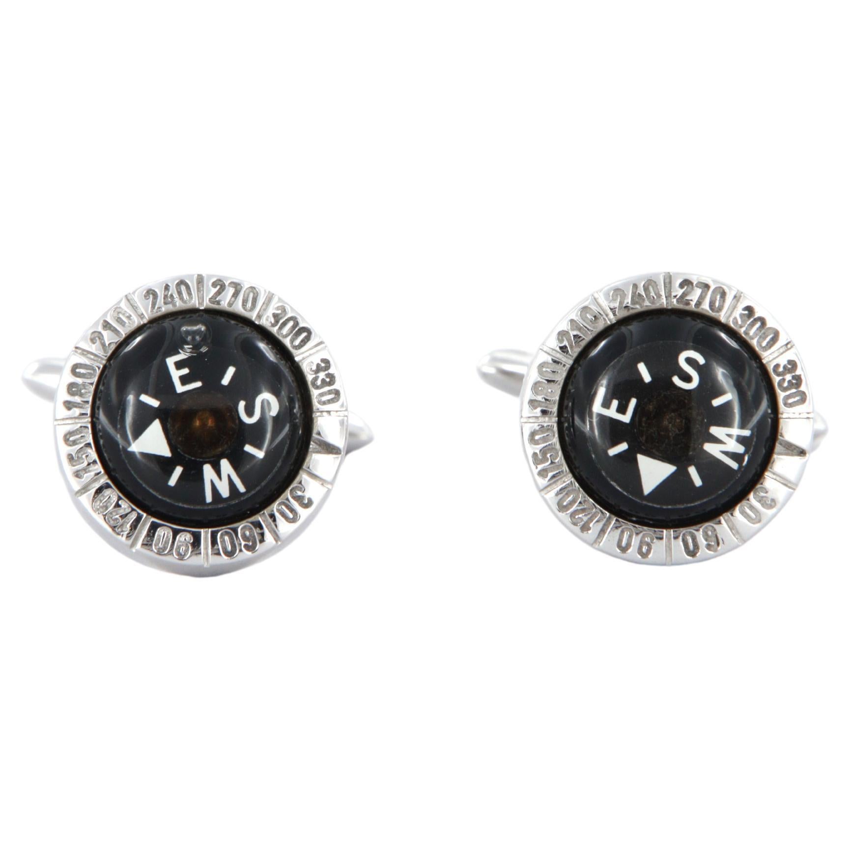 Gemelli con bussola in oro bianco 18k