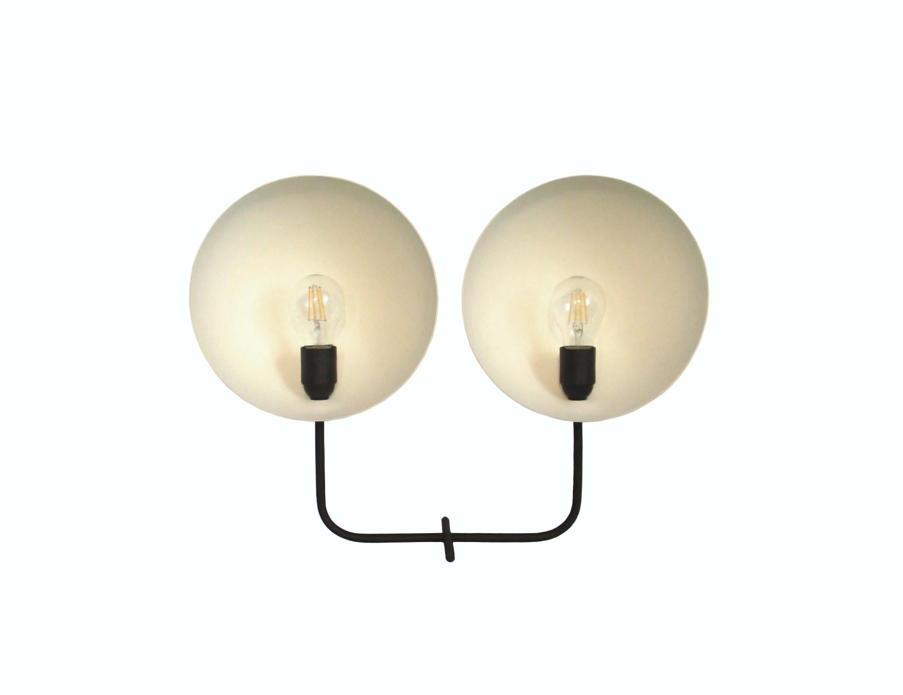 Two rotational domes allowing the direction of the light, for direct or indirect lighting, as the user desires, providing sensations to daily life, home work, relaxing time, reading etc. The dynamic and symmetrical design allows the user to choose