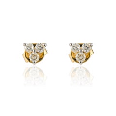 Clous d'oreilles Pushback en or jaune massif 18 carats avec trois diamants naturels