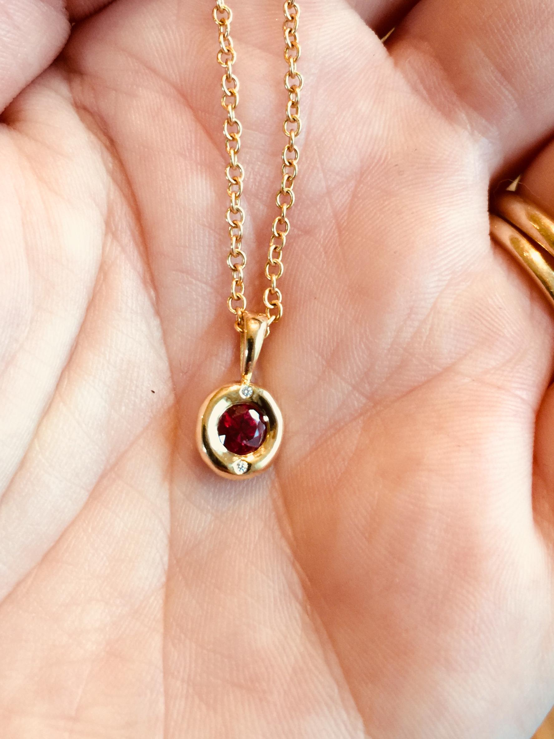 A ruby nested in 18 karat gold, worn independently or in multiple. Soft and sweet yet bright and daring. Hand carved wax/cast 18k gold bezel. $1,760. This price is for one single pendant. 

Other gems available, please contact for