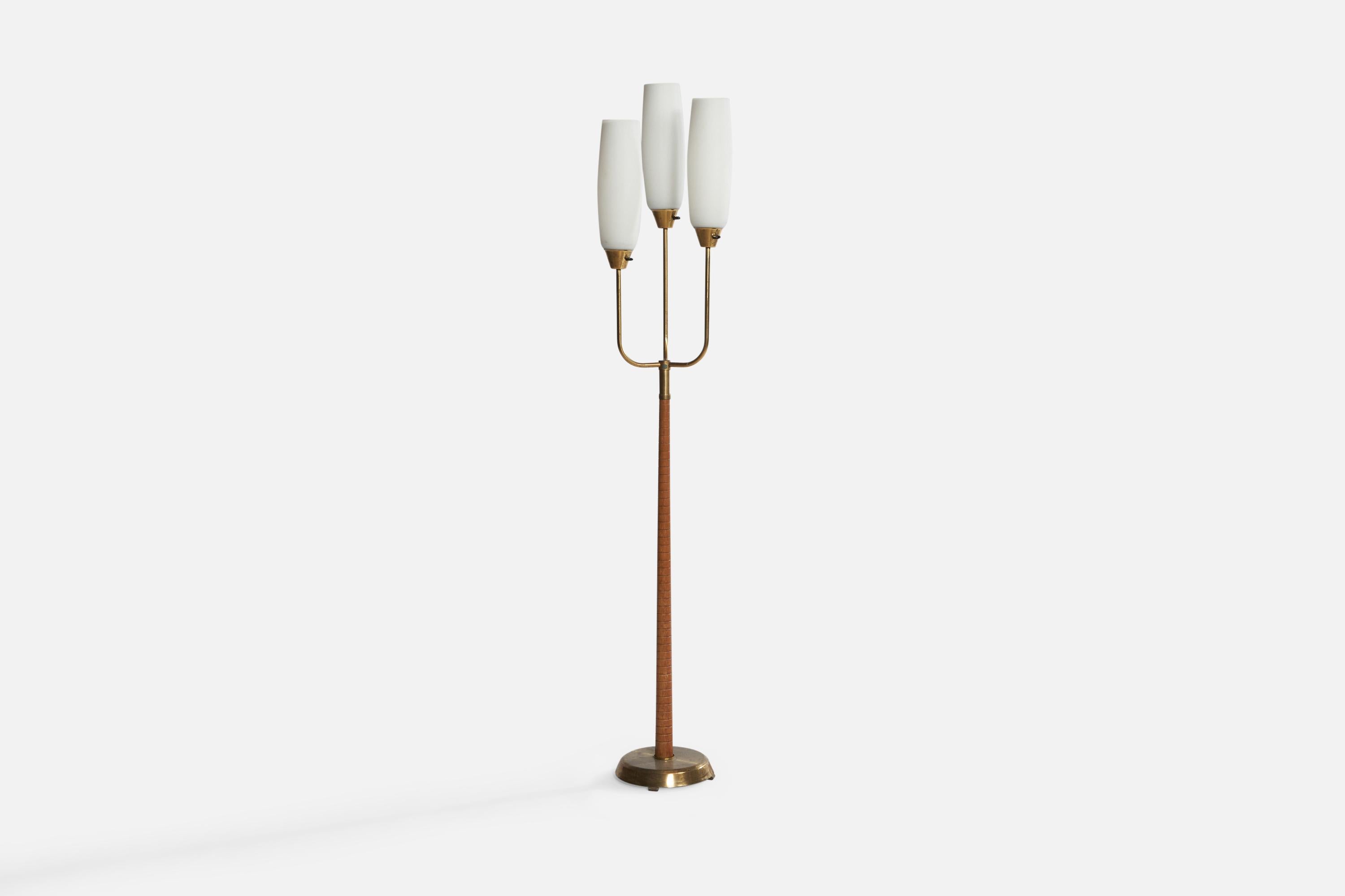 A three-armed brass, elm and opaline glass floor lamp designed and produced by GEMI, Sweden, 1940s.

Overall Dimensions (inches): 70.75” H x 12.5” W 13.5” D. Stated dimensions include shades.

Bulb Specifications: E-26 Bulbs

Number of Sockets: