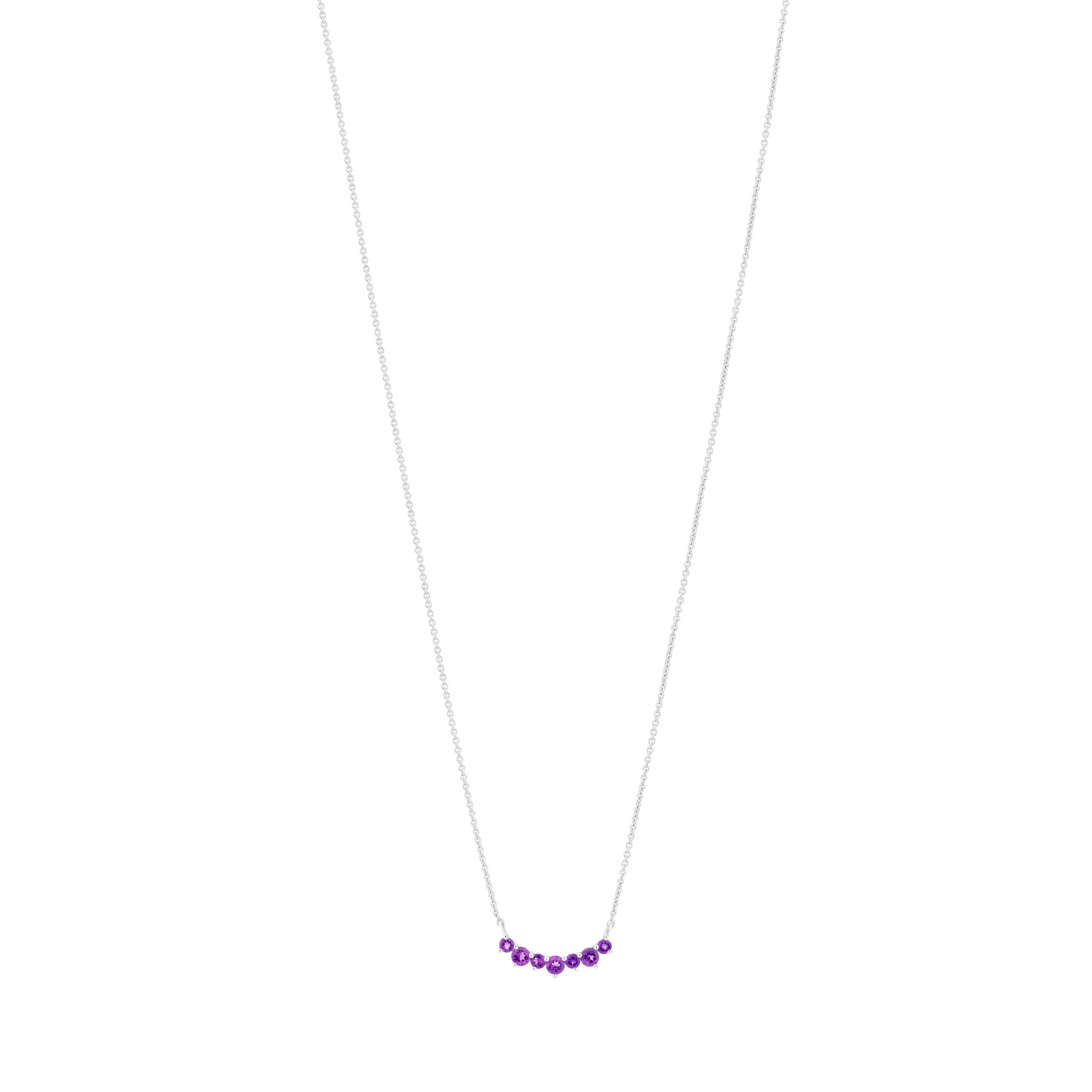This Gemistry Amethyst Pendant Necklace is Hand Crafted in 14k white gold. It features three 2.50mm with four 2mm round alternating genuine amethyst stones in a prong setting. It Includes Rolo chain measuring 18 inches with lobster closure. The drop