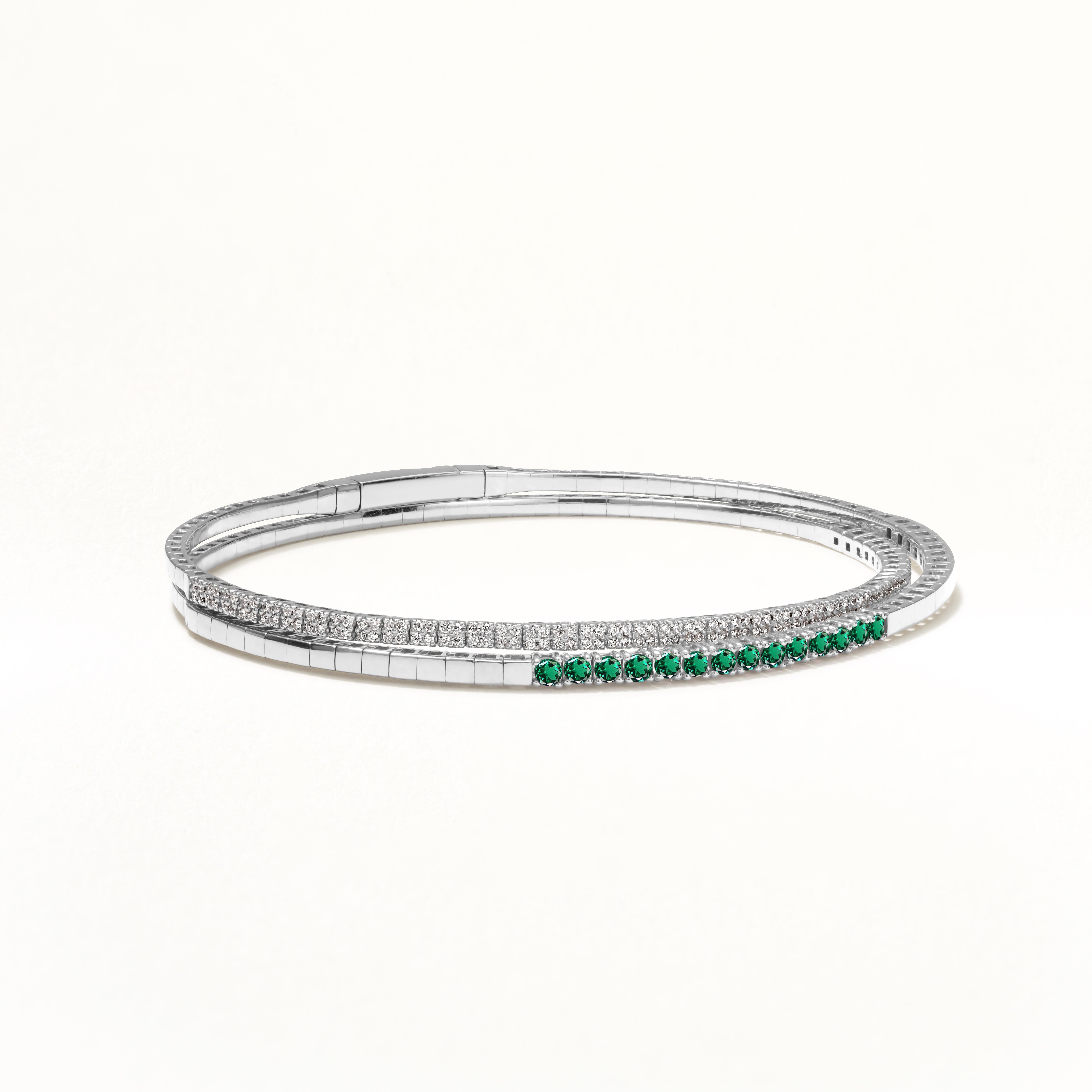 Contemporary Gemistry 0.65cttw. Emerald and Diamond Rolling Bangle in 18k White Gold For Sale