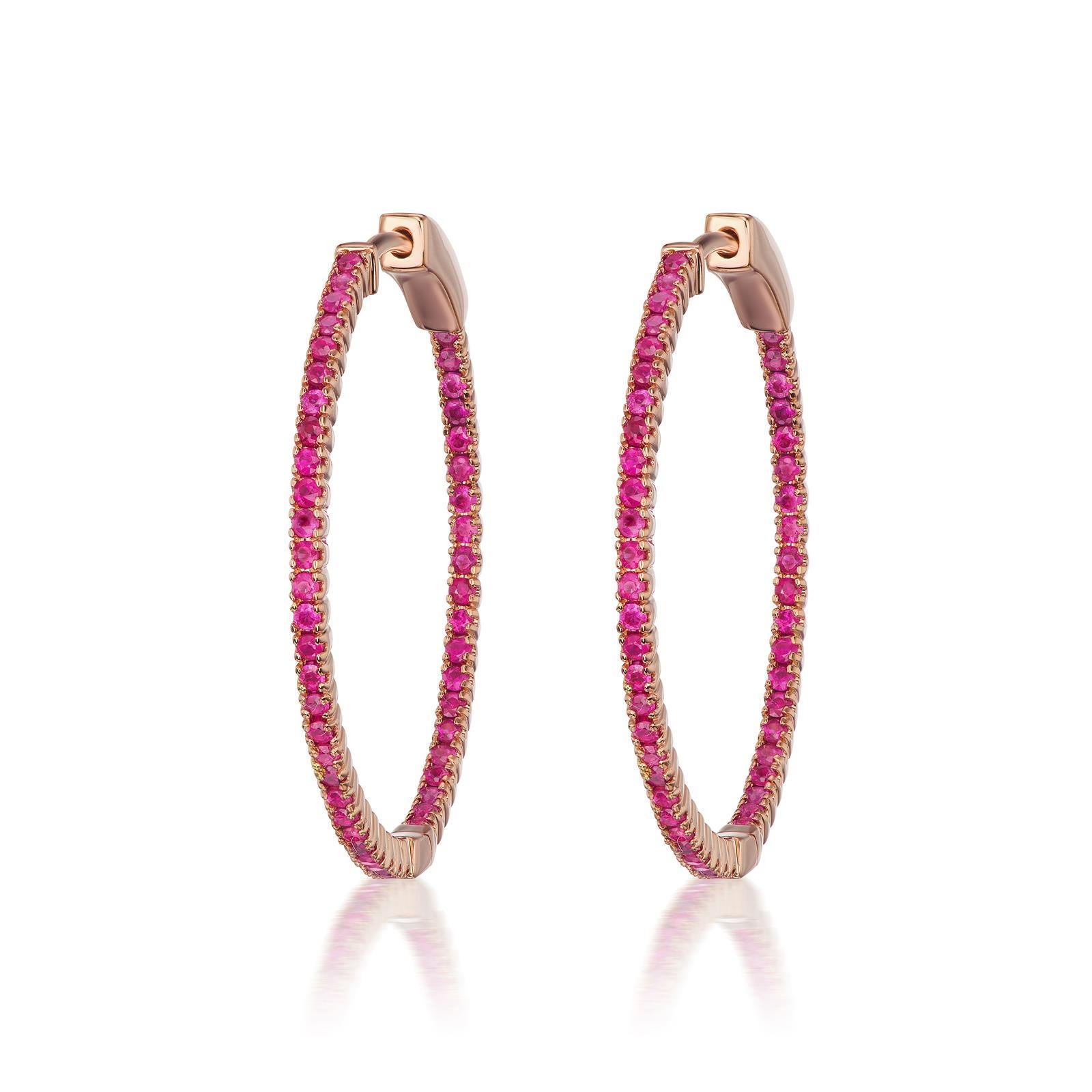These Gemistry hoop earrings have the distinctive red glimmer of the Ruby. Gleaming from the inside and outside, 0.96 Ct. t.w. ruby rounds illuminate the polished 18k rose gold hoops.
Hanging length is 1”.
Please follow the Luxury Jewels storefront