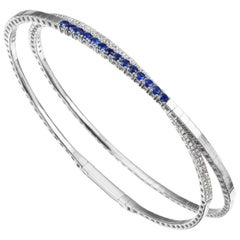 Gemistry 1.14 Ct T.W Blue Sapphire and Diamond Rolling Bangle in 18k White Gold