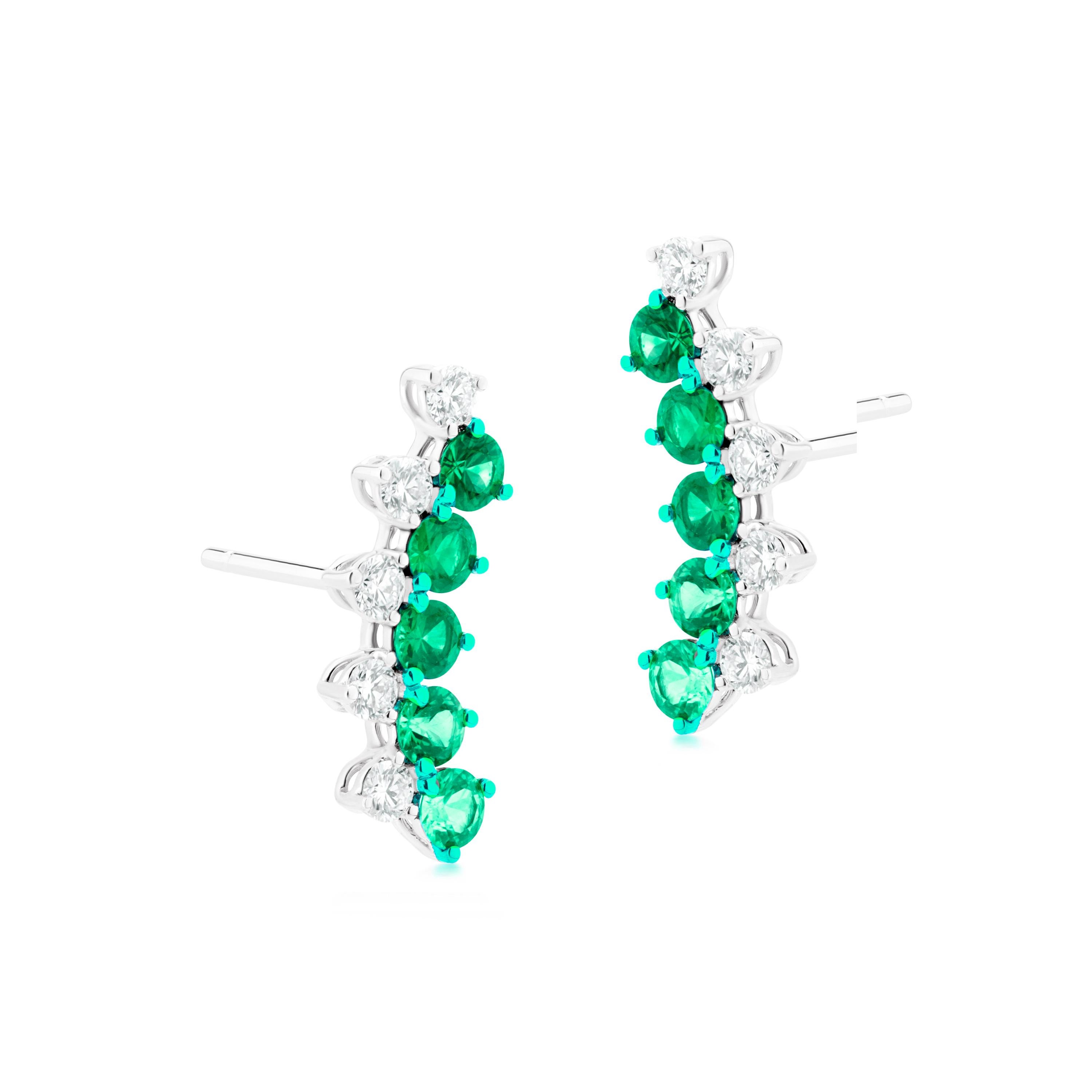 Elevate your elegance with the captivating allure of the Gemistry 1.48 Cttw. Emerald and Diamond Ear Climber in 18K White Gold with exquisite green rhodium accents. This remarkable piece redefines sophistication and style, showcasing a harmonious