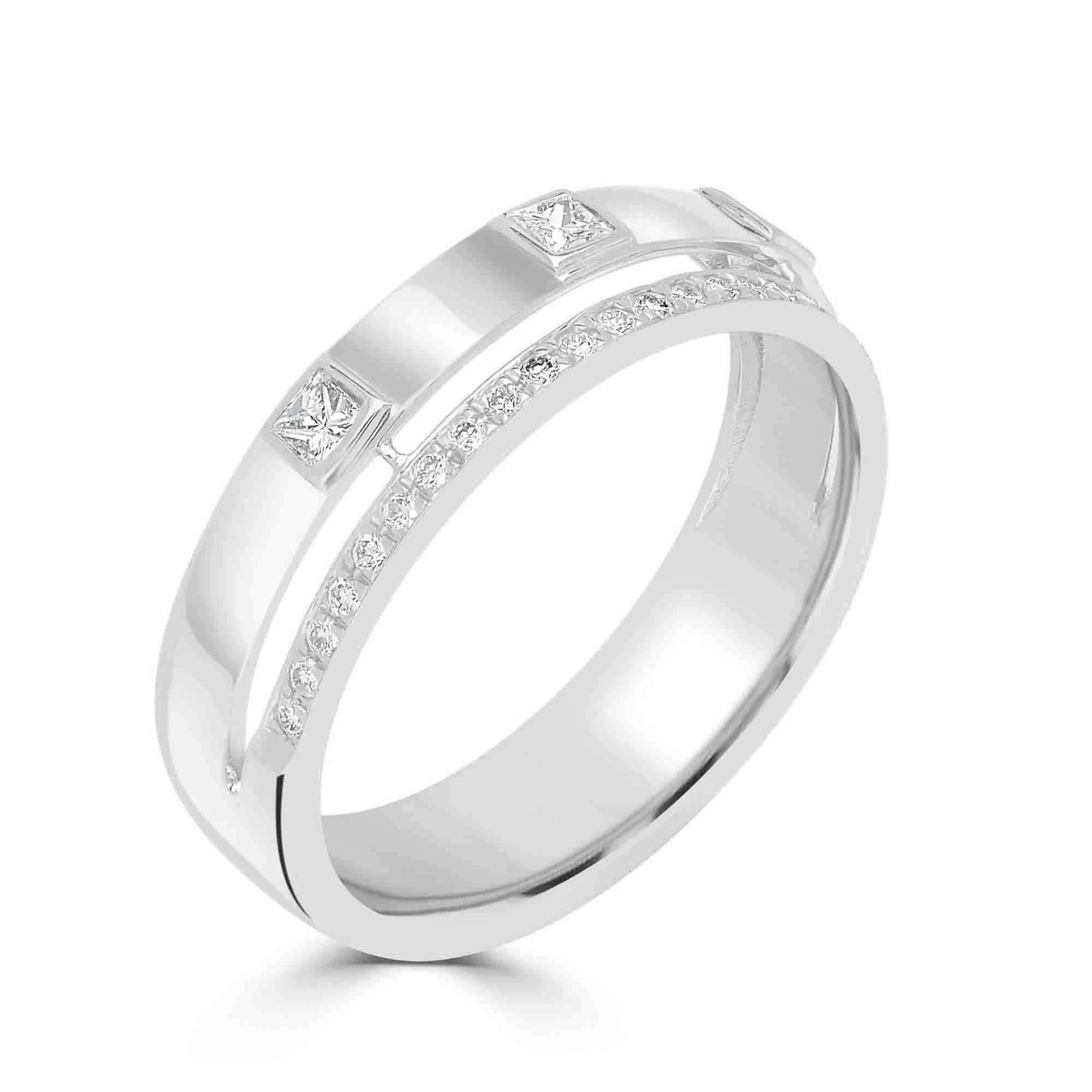 This band ring is made of 14K white gold and is a must-have! This ring's spaced-out 0.25 Ct round full-cut and square princess-cut diamond stations contrast flawlessly with each diamond's partnering sequence. Give it to your special someone on your