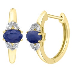 Gemistry 1.55 Carats Oval Blue Sapphire Hoop Earrings in 14k Yellow Gold