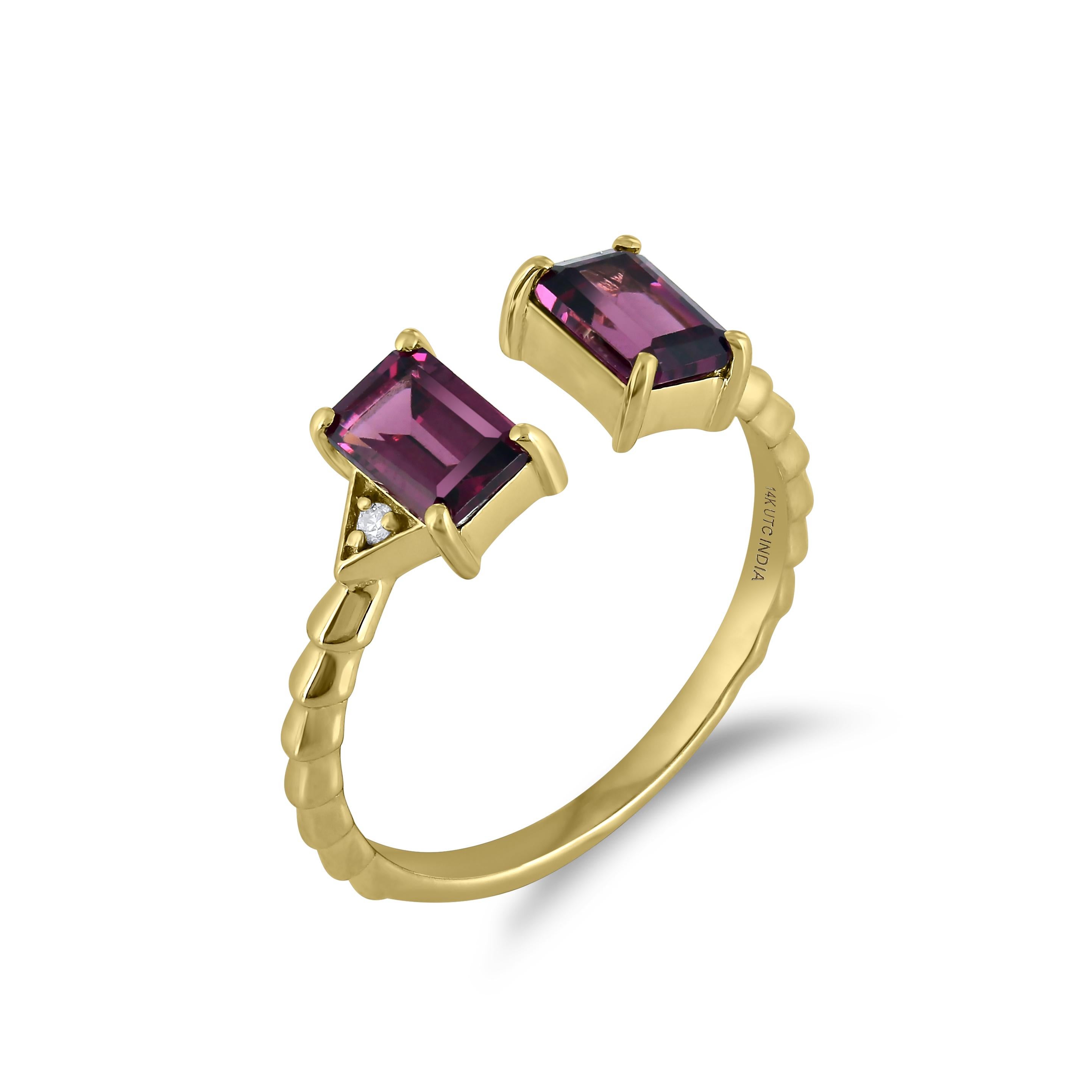 Lovingly known as the “all purpose stone”, two octagon-cut protective Rhodolite stones in a prong setting are affixed on the 14K Yellow Gold cuff ring. The diamonds are I1 in clarity, and GH in color, weighing 0.02 Cts. Two round full-cut White