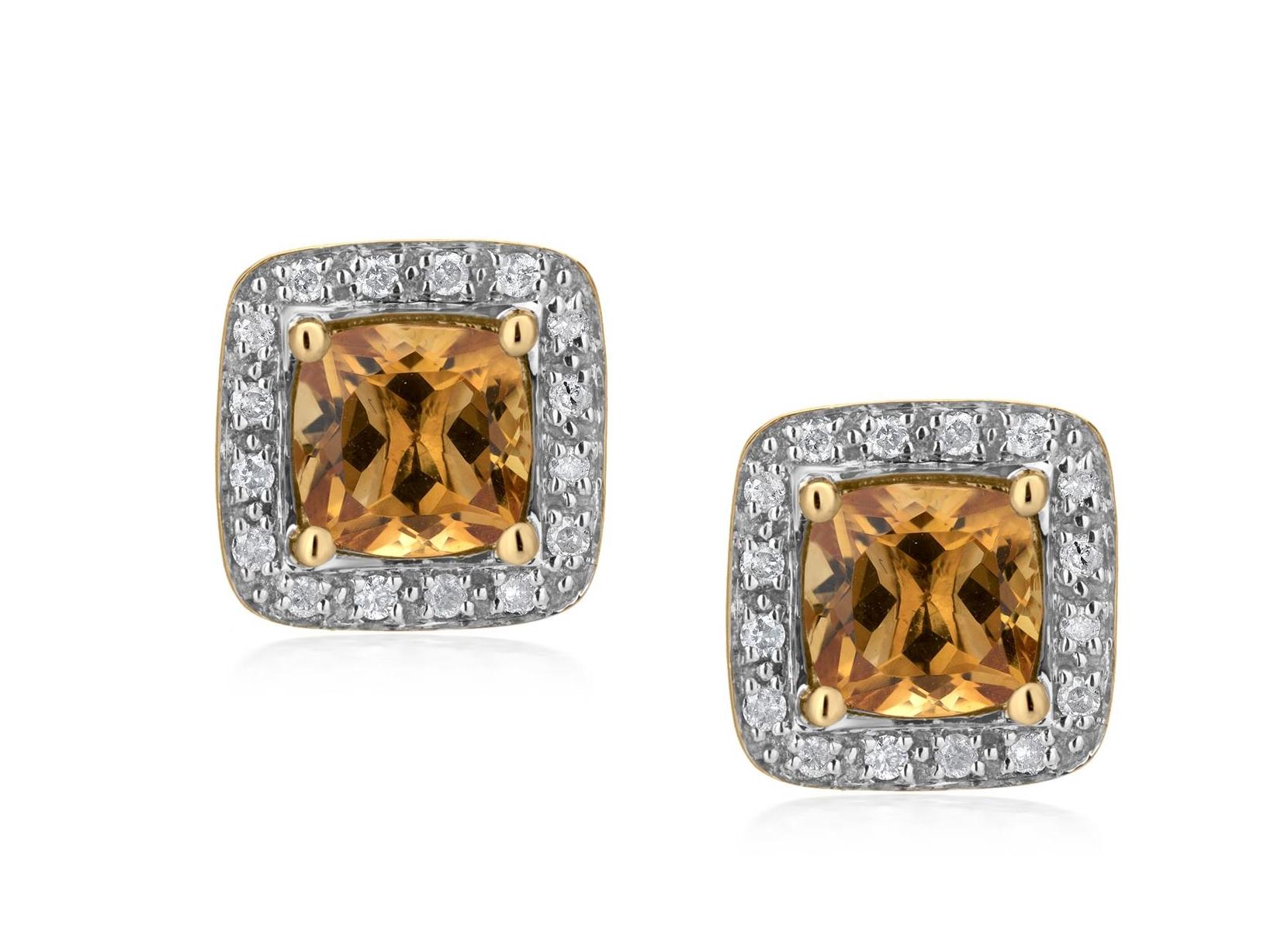 The sunny glow of these stud earrings evokes feelings of warmth and delight. This Gemistry stud earring features 6 mm cushion cut 1.78 carat citrines set in 14k yellow gold accentuated by halos of white pave. Post and Clutch, citrine stud