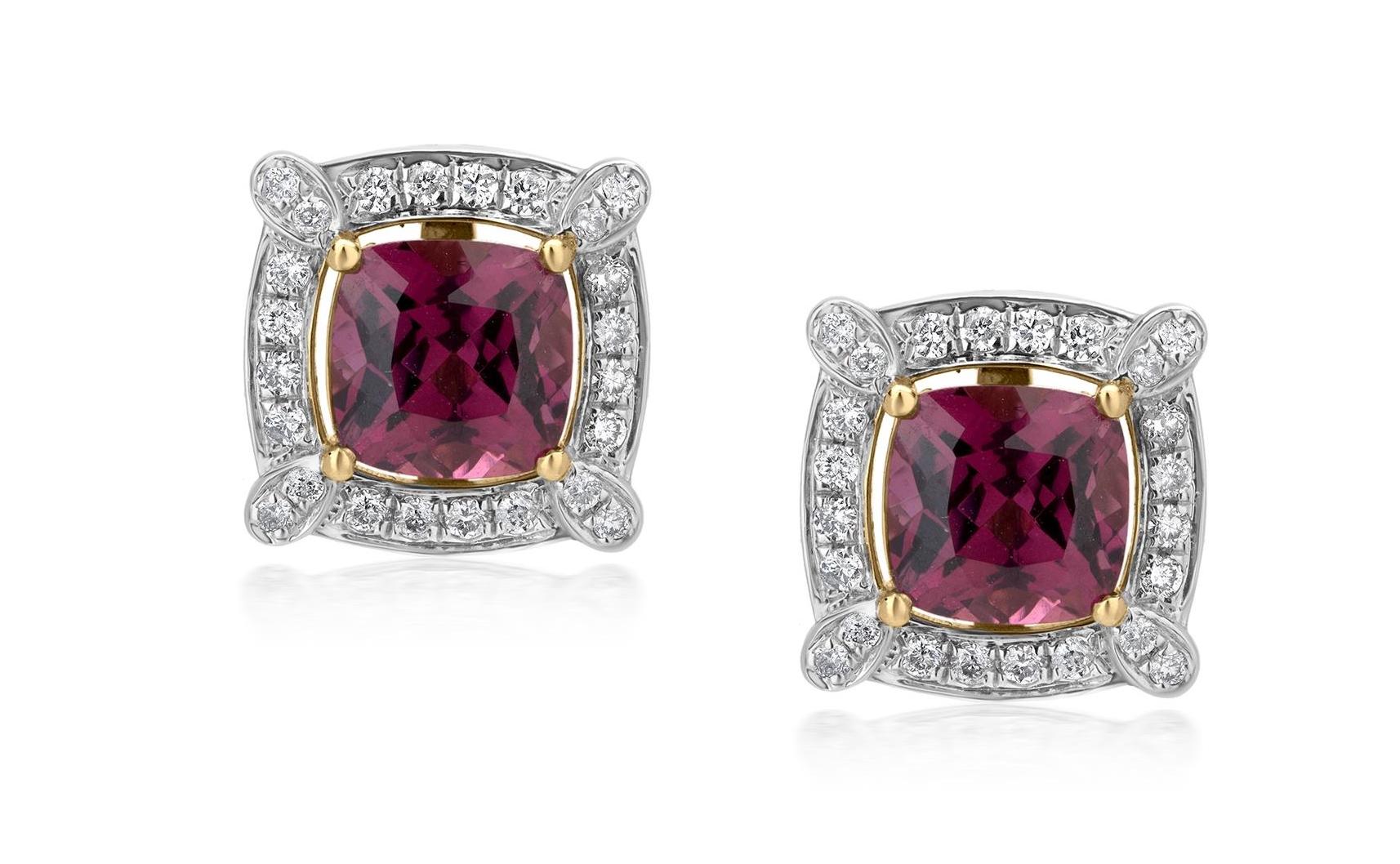 This charming pair of Gemistry diamond halo stud earrings are made of 14K yellow and white gold. The garnet stud earrings are elegantly decorated with 48 precious Round Full Cut Diamond in a Micro Pave setting. The diamonds are GH in color and