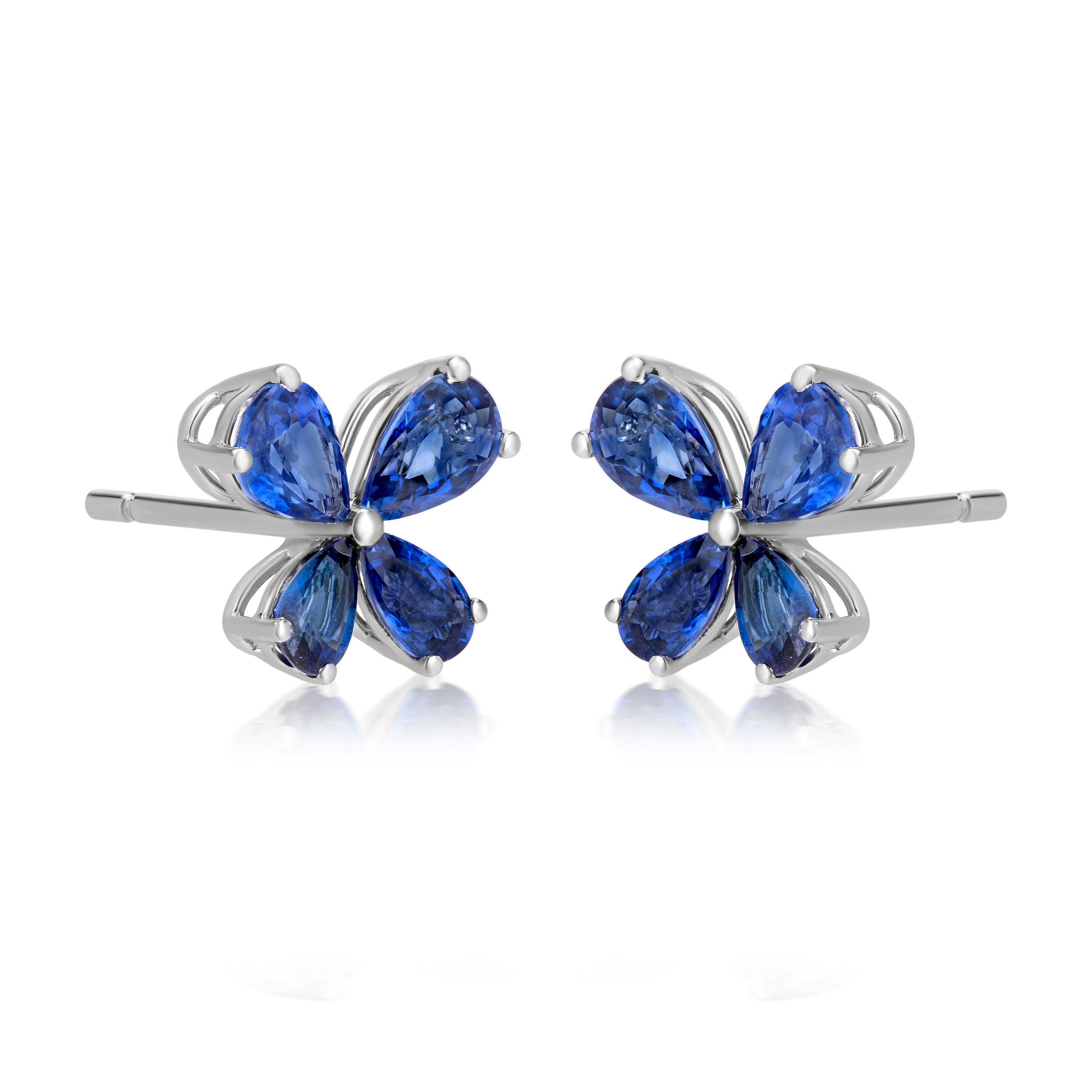 Nature inspired floral stud earrings ! Our blooming flower stud earring features 3.45 ct. t.w. blue sapphire pear petals prong set in polished 18k white gold. Pin-push blue sapphire stud earrings. These Gemistry modern stud earrings are elegant,