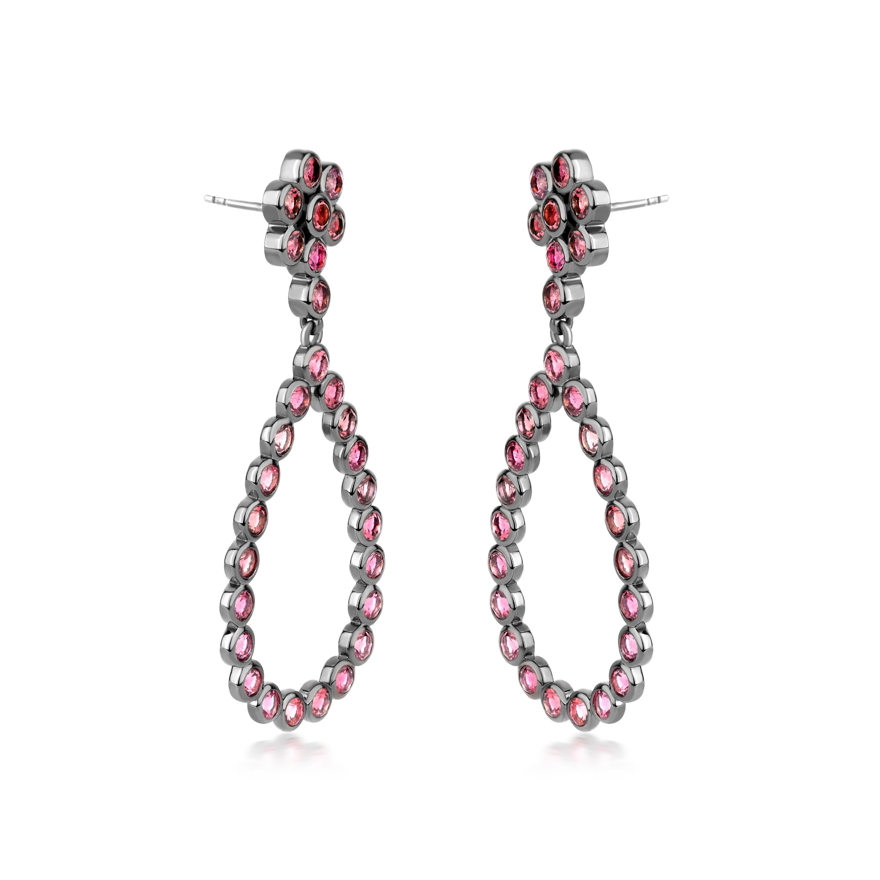 Introducing Gemistry 6.64 Ct.t.w. Pink Tourmaline Teardrop Earrings in 925 Sterling Silver, the drop earring features 3mm round pink tourmalines arranged in a floral set up at surmount and the drop is an open teardrop design. Mounted on 925 sterling