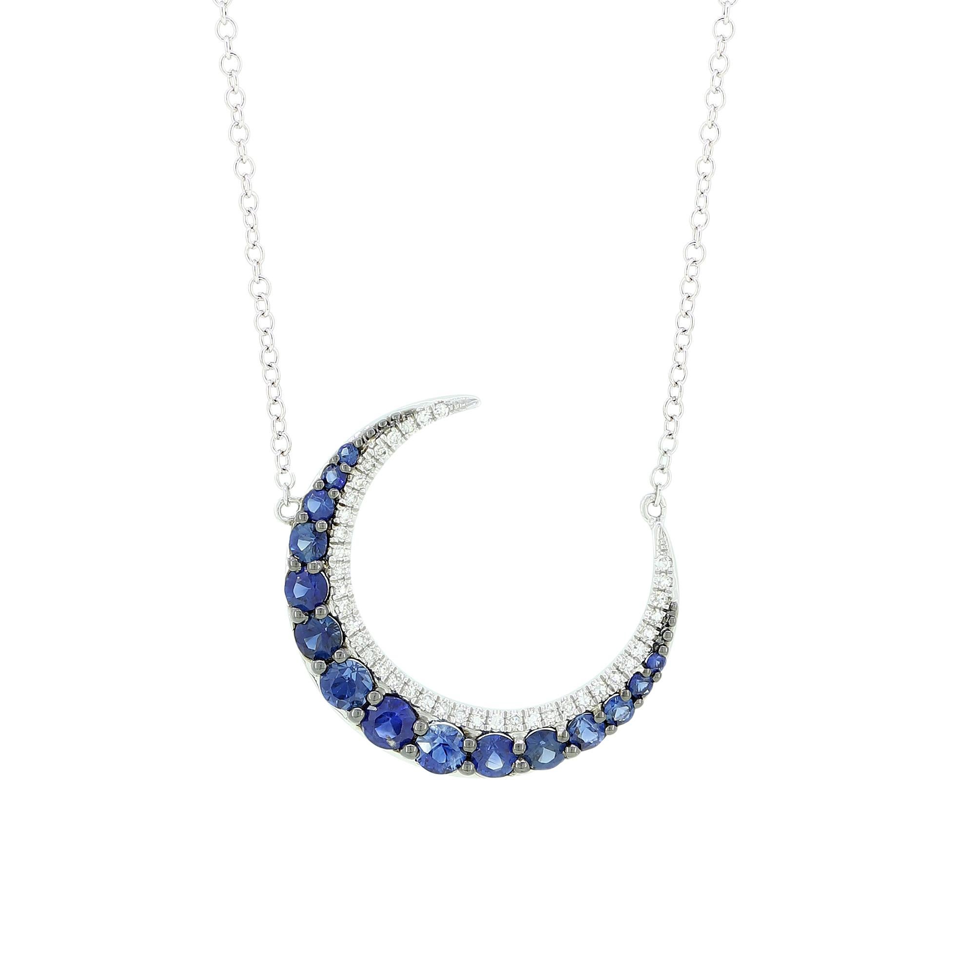 This Gemistry celestial spectacle is a reminder that you deserve the moon. This necklace swings in 18k white gold crescent moon lit with .74 ct. t.w. round prong set blue sapphire and pave diamonds. Stationed along a 15