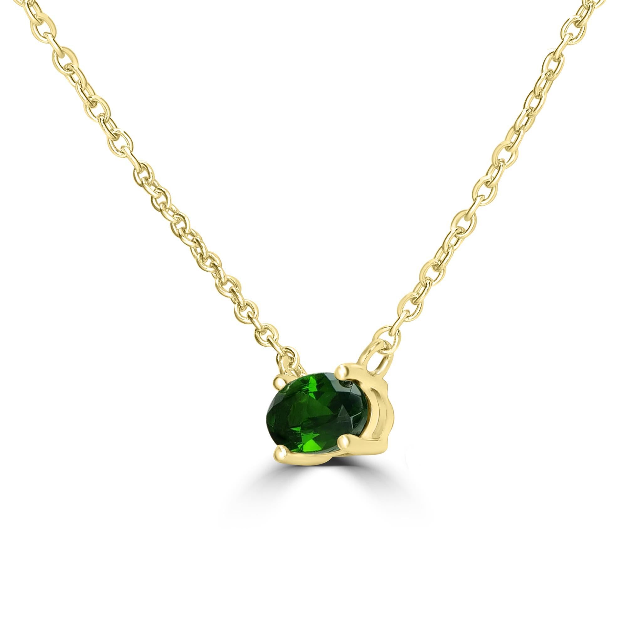 Un magnifique collier à pendentifs pour éblouir votre décolleté. Ce collier est composé d'un pendentif ovale en pierre précieuse et d'une jolie chaîne. Ce collier est réalisé en or jaune 14 carats.
Le collier pendentif présente un diopside chromé