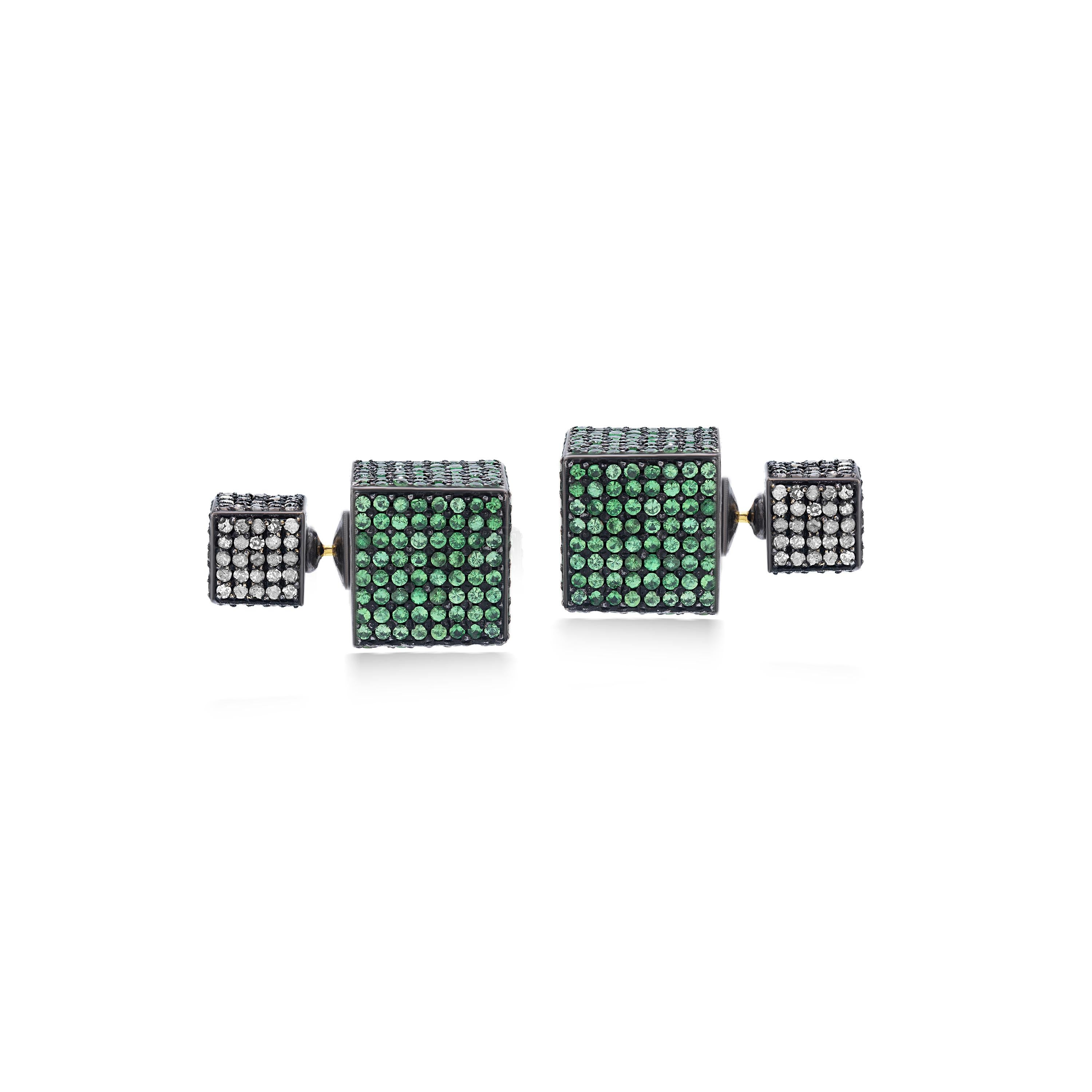 This Gemistry Victorian 10.55 Ct. T.W. Diamond and Tsavorite Cube Stud Earrings features Tsavorite cubes dangling form diamond studded surmount. Rendered in 18k gold and 925 silver this ageless classic is embellished with diamonds, weighing 2.37