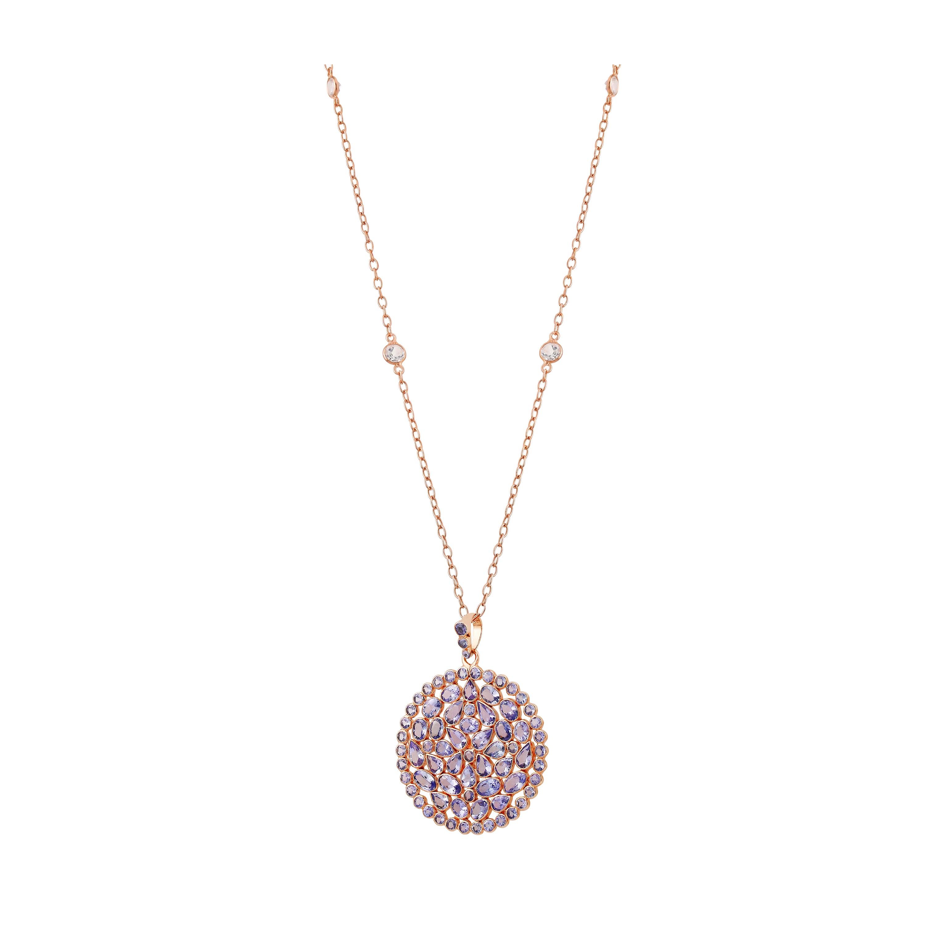 Add some finesse to your outfits with this Gemistry Victorian gorgeous pendant necklace. Magical Tanaznites are set within a sparkling frame of white topaz in this handcrafted necklace of sterling silver, plated in rose. Wear it solo or match it