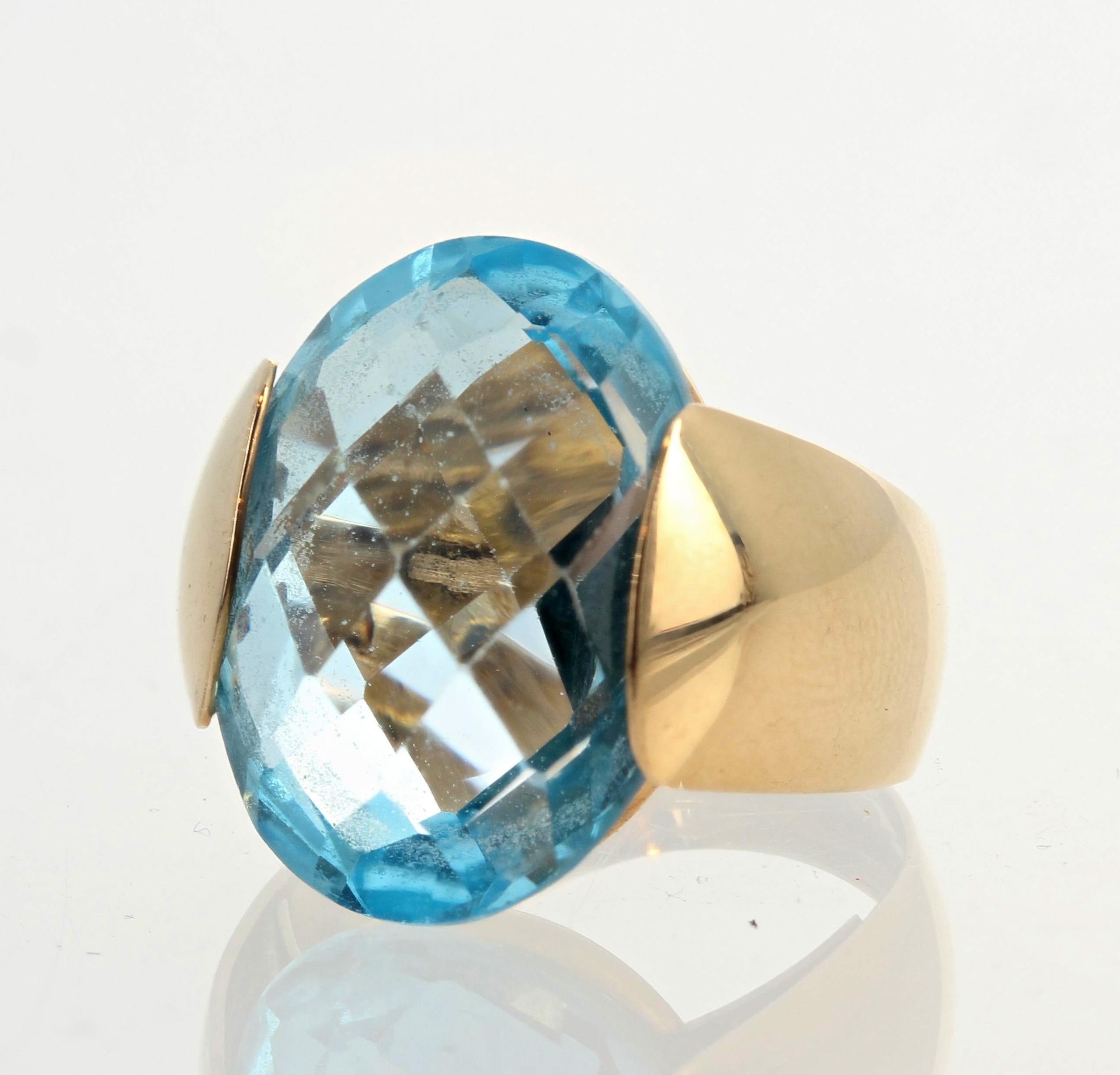 Women's or Men's AJD Gorgeously Modern Fiery 14.75 Ct. HUGE Oval Sky Blue Topaz Gold Ring For Sale
