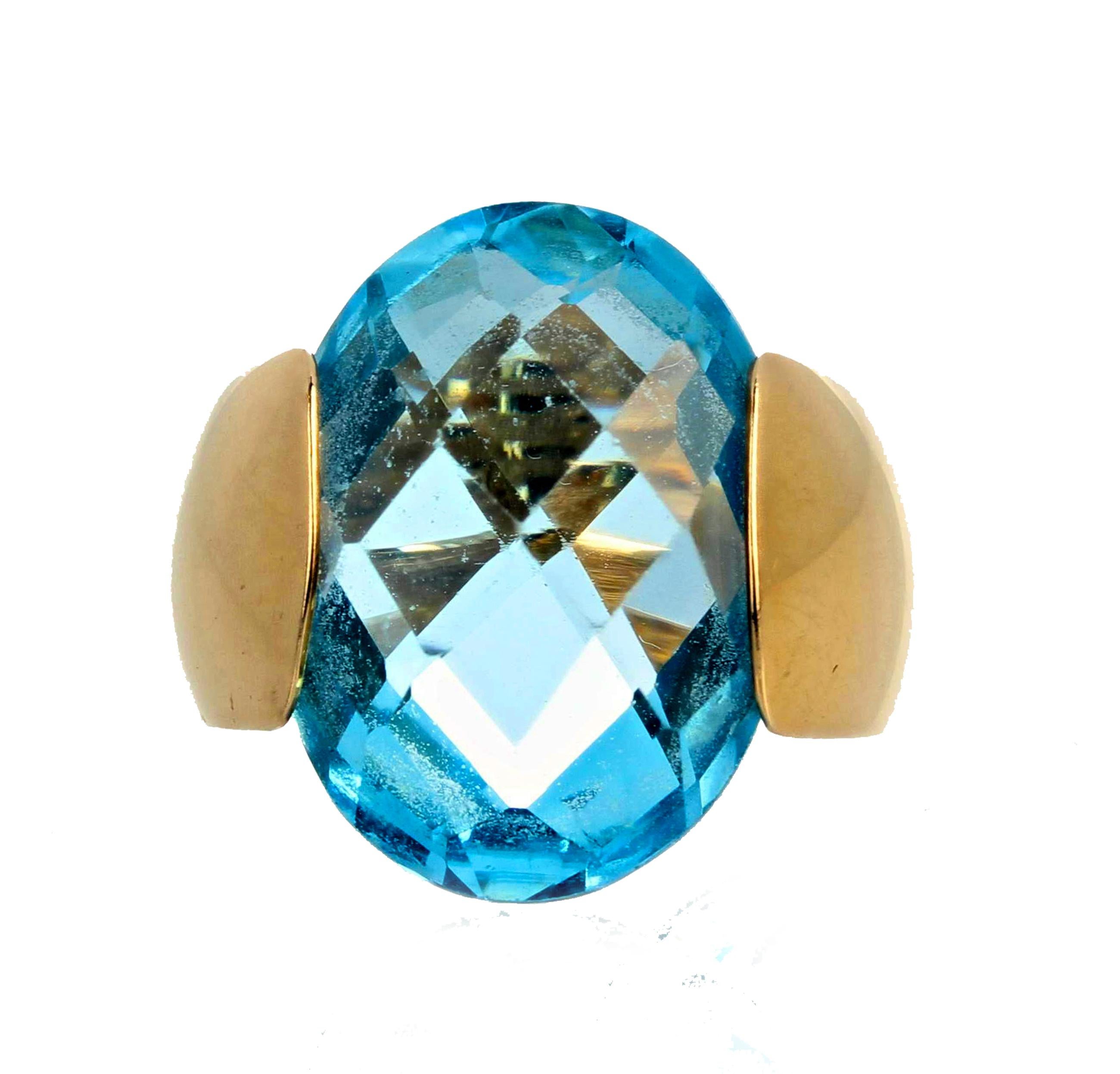 This uniquely set elegantly modern checkerboard gem cut 14.75 carat Sky Blue Topaz ring is absolutely stunning with no eye visible inclusions.  You can comfortably wear this size 6 (sizable)  ring with jeans or elegant evening wear.  This glittering