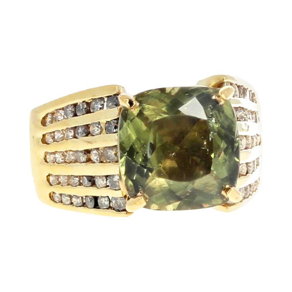 This glittering elegant natural sparkling green 3.81 carat Zircon from Sri Lanka (9 mm x 9 mm)  is  set in 14K yellow gold with tiny diamonds down the sides. It is currently a size 5 sizable (we size for free). 