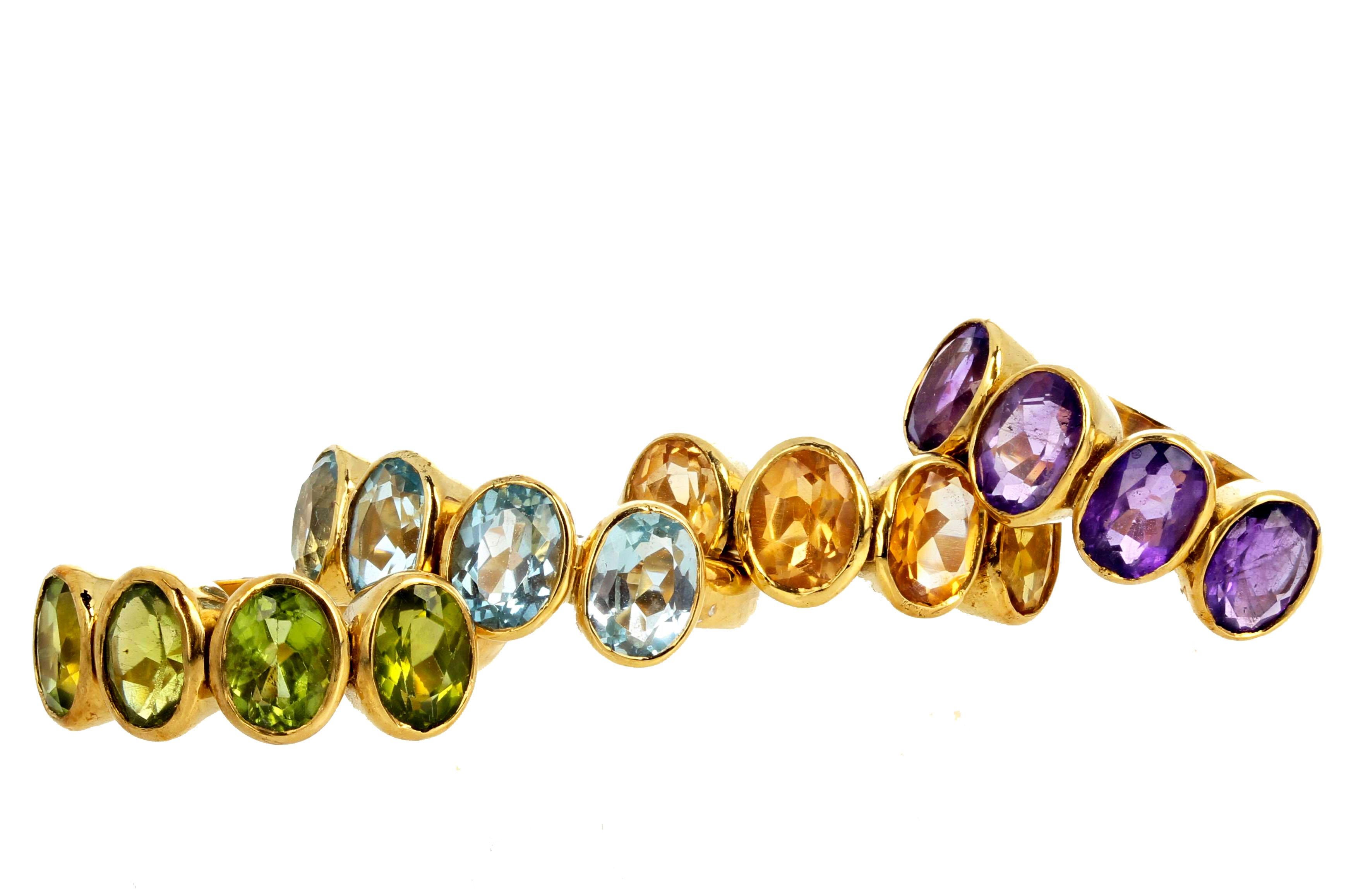 These modern stackable bright 18Kt yellow gold rings were designed to be warn together or individually.  Each sparkling gemstone is approximately one carat.  These Keep-Stone rings will be treasured forever.   They are a size 7 (sizable). 