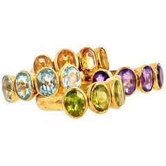 AJD 4 Stackable Amethysts Citrines, Peridots, Aquamarines 18Kt Gold Rings