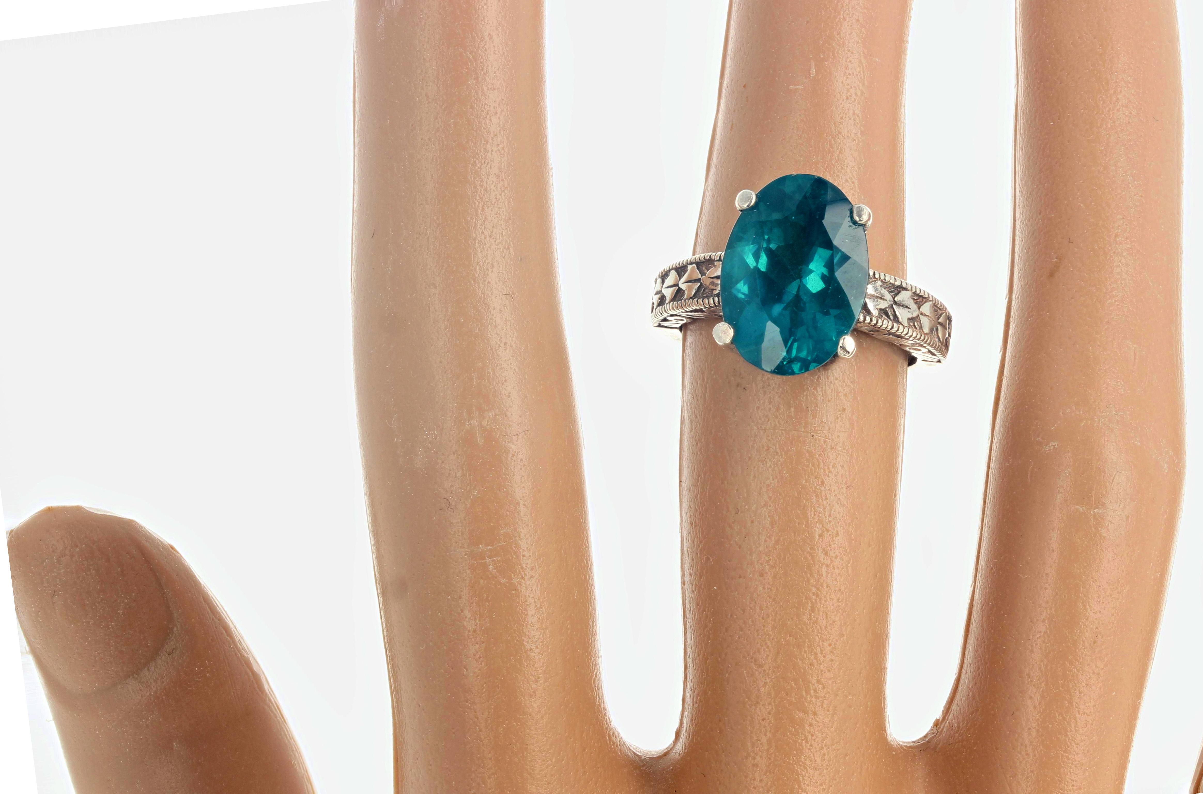 The dazzling intensity of this extra large 4.6 carat natural deep turquoise blue color oval Apatite sparkles in this solitaire sterling silver setting size 7 (sizable).  This Apatite is unheated untreated natural gemstone.  
