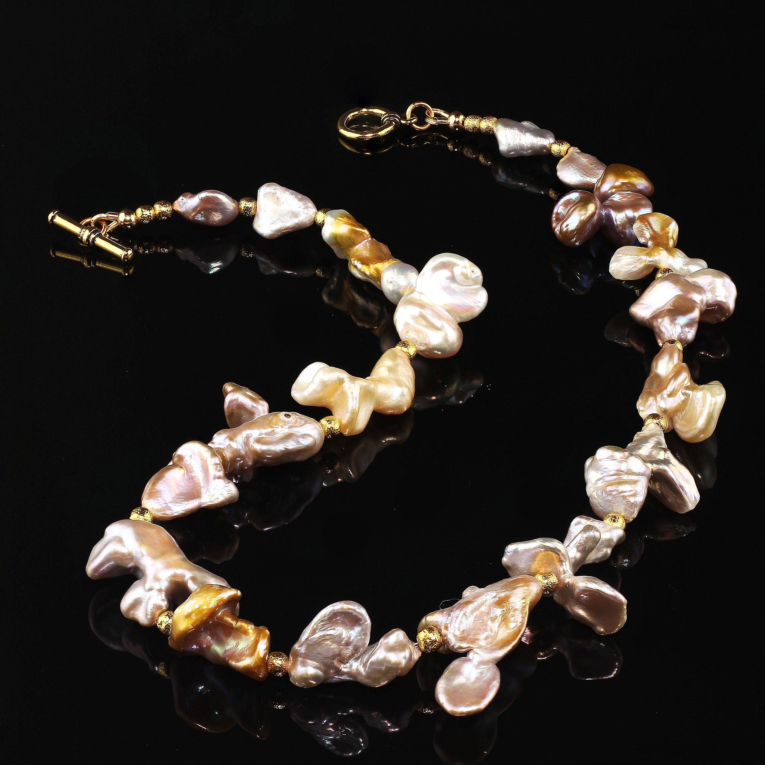 No Grit No Pearl

One of a kind  short Pearl Choker necklace of unusually shaped Pearls with frosted 22 karat gold plated copper accents.  These unique Chinese Fresh Water Pearls are silvery with golden tones along with pink and purple flashes. 