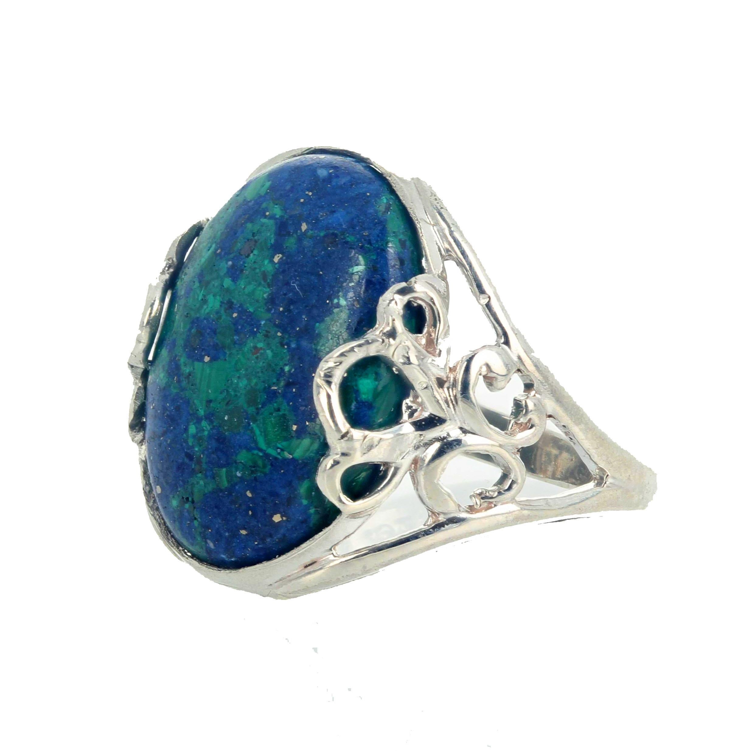 This fascinating Chrysocolla Natural Semiprecious Polished Gemstone is 18mm x 15.5 mm set in a lovely sterling silver 