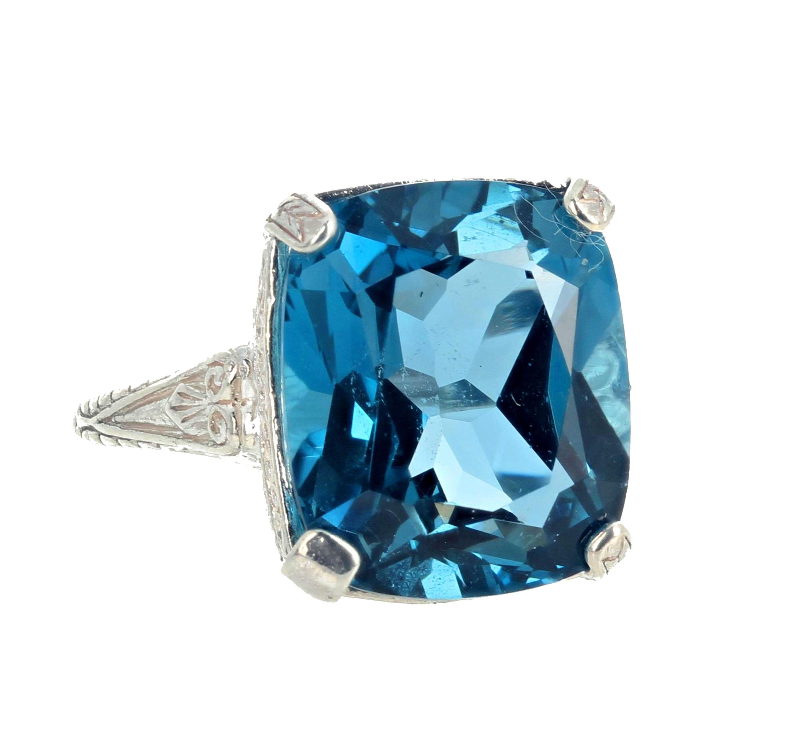 This stunning intensely London blue 11.65 carat Topaz (14mm x 12 mm) classic solitaire ring is truly dazzling.  You won't believe how much this gemstone sparkles.  It is set in a sterling silver ring size 7 (sizable).  This is the perfect gift to