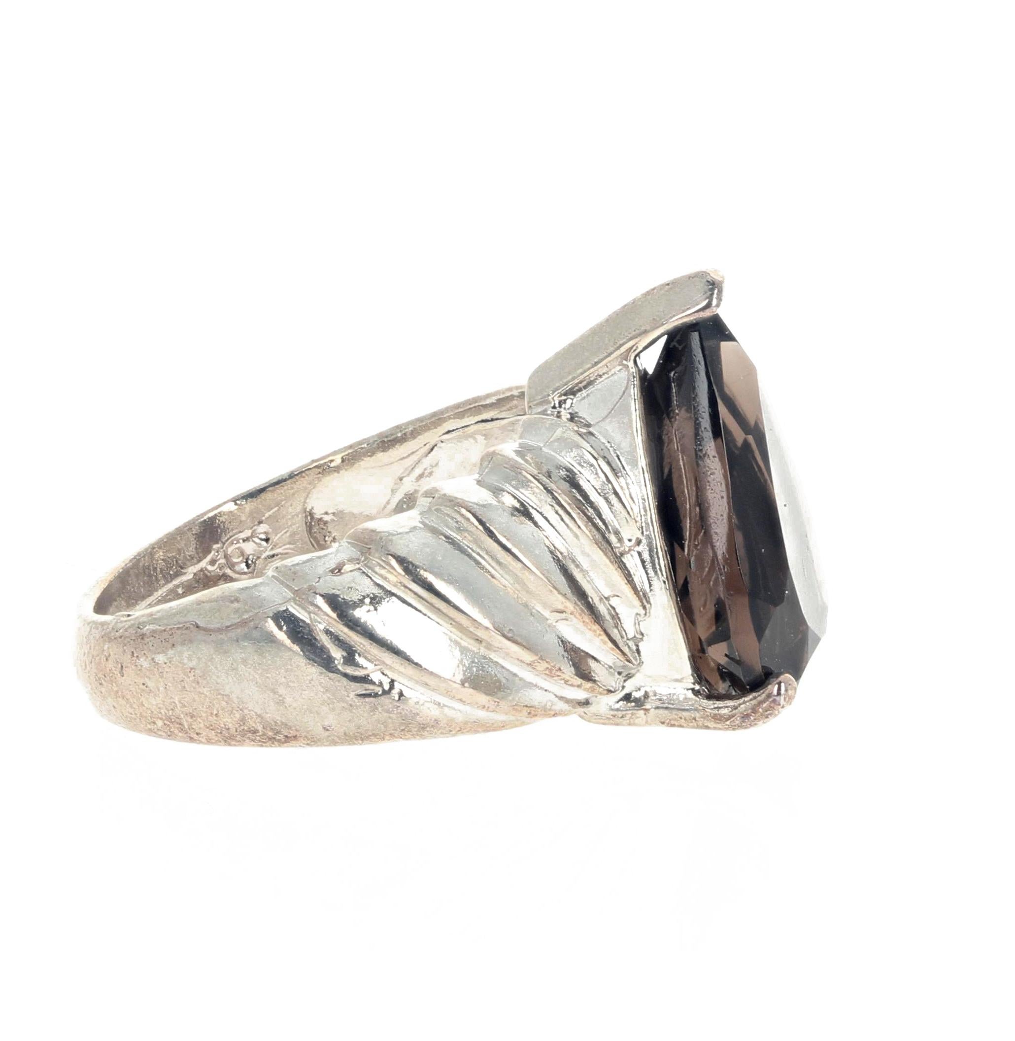 This lovely artistic setting holds a beautiful very dark clear natural 2.45 carat Smoky Quartz in this sterling silver ring size 7 (sizable - we size for free).  