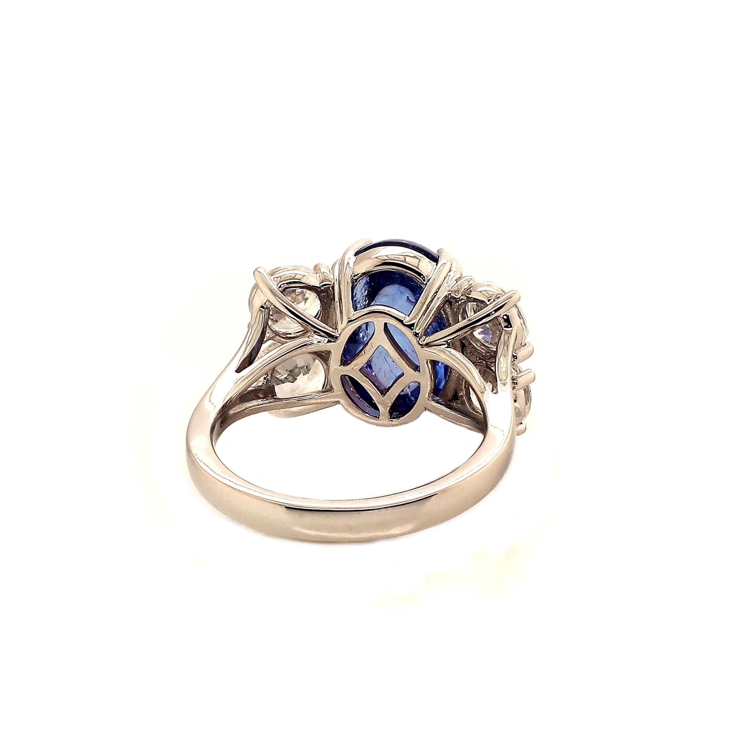 AJD Dinner Ring of Cabochon Tanzanite and Sparkling Genuine Zircons In New Condition For Sale In Raleigh, NC
