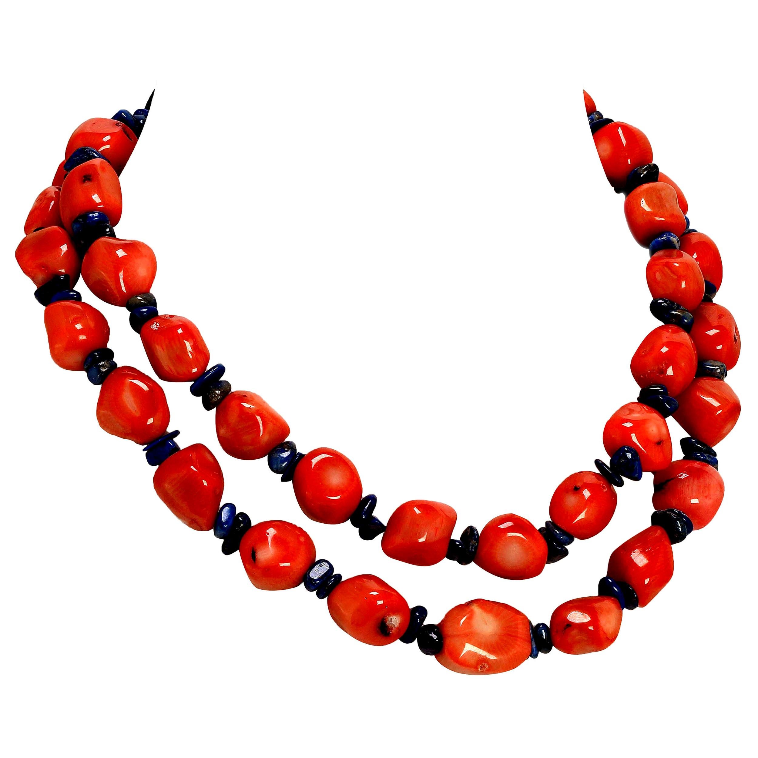 Handmade necklace of peach Coral and Lapis Lazuli in two strands to grace your neckline.  Wear this lovely, fresh as Springtime, necklace with all your Spring ensembles. The peach bamboo Coral is so perfectly complemented by the highly polished blue