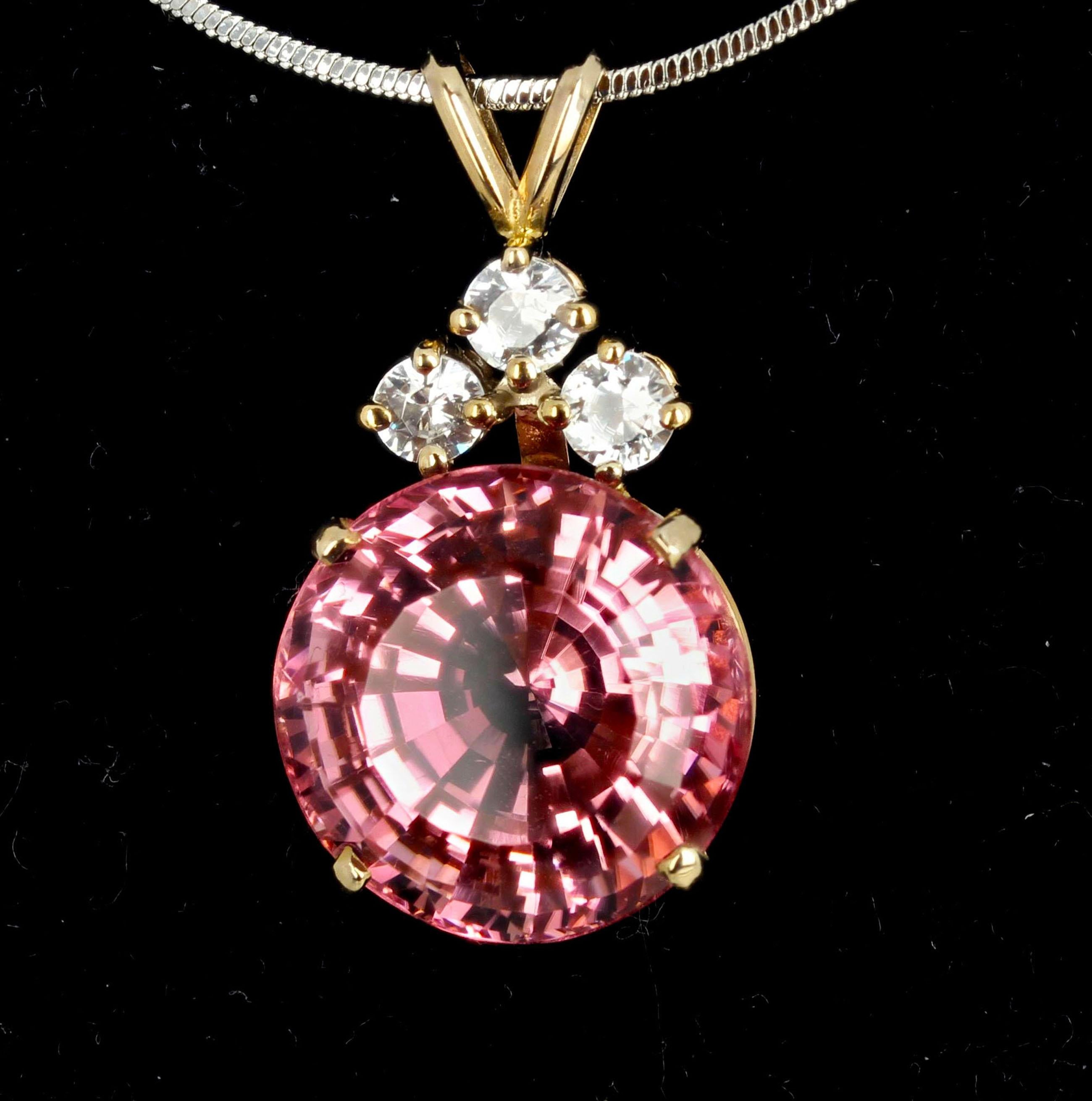 This beautiful pendant is a huge sparkling natural pink round gemcut 18.7 Carat 16 mm translucent clear Tourmaline enhanced with little glittering NATURAL white Spinels set in this lovely 10 Kt white gold pendant.  This 