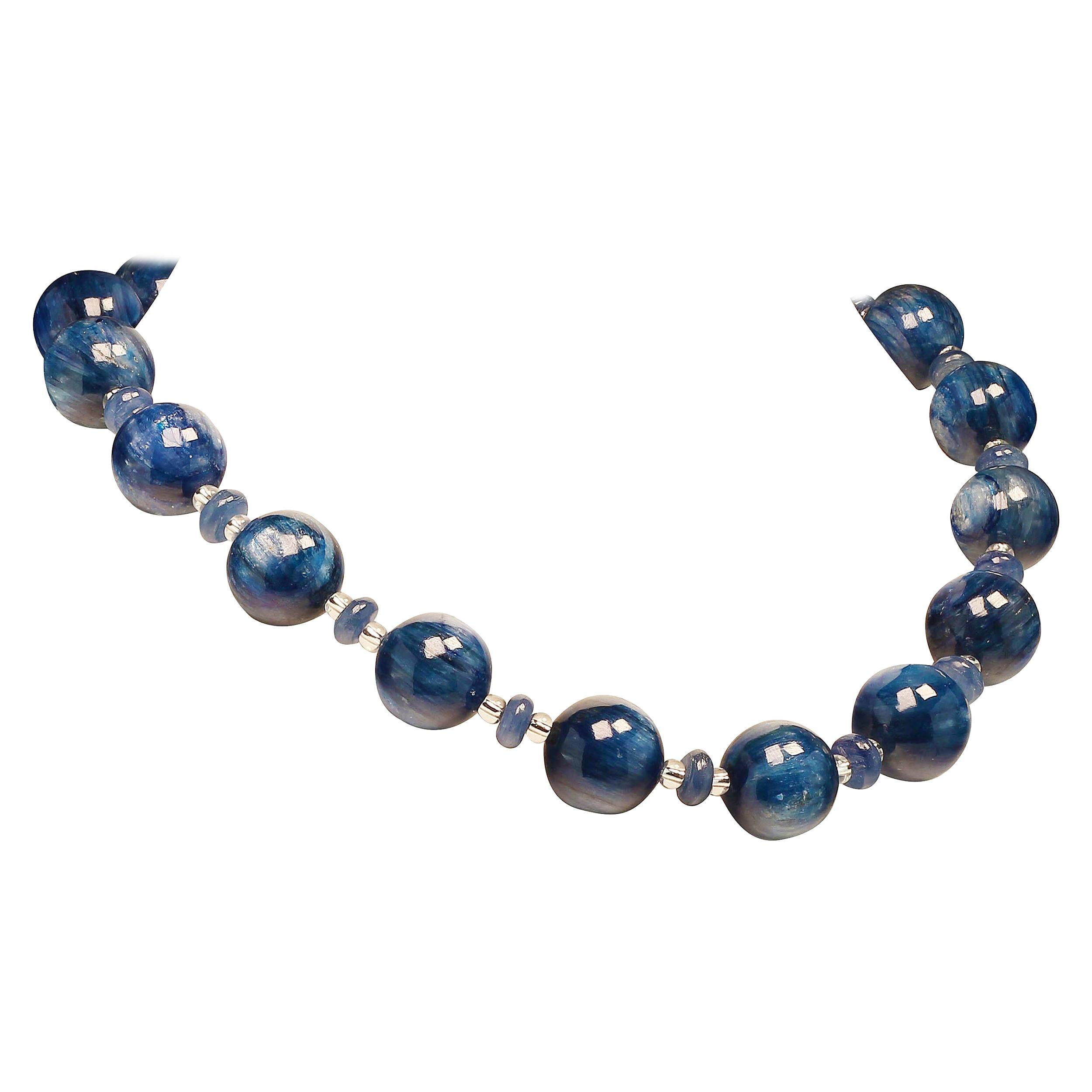 Custom made, stunning Blue Kyanite necklace of 18 MM highly polished spheres accented with Kyanite rondelles and silver Czech beads.  This unique necklace is for those who love Kyanite and love blue.  The 19 inch necklace is secured with a Sterling