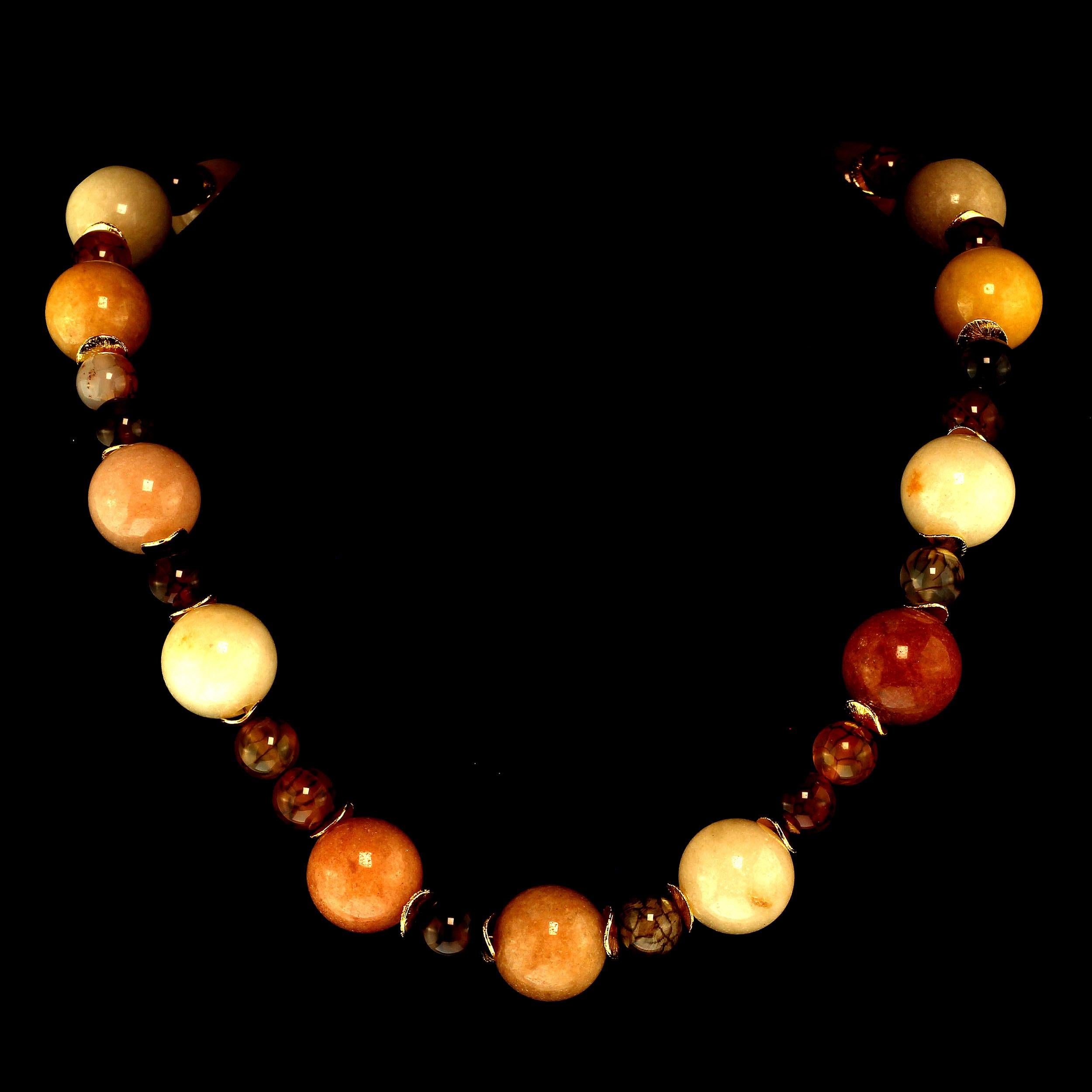 Unique, hand made  22 inch  dyed Jade and  Spiderweb Jasper necklace to brighten your day.  The 18 MM Jade is multi shades of gold and cream.  The distinctive 10 MM Spiderweb Jasper is various shades of rust, cream, and brown with the 'webs' weaving