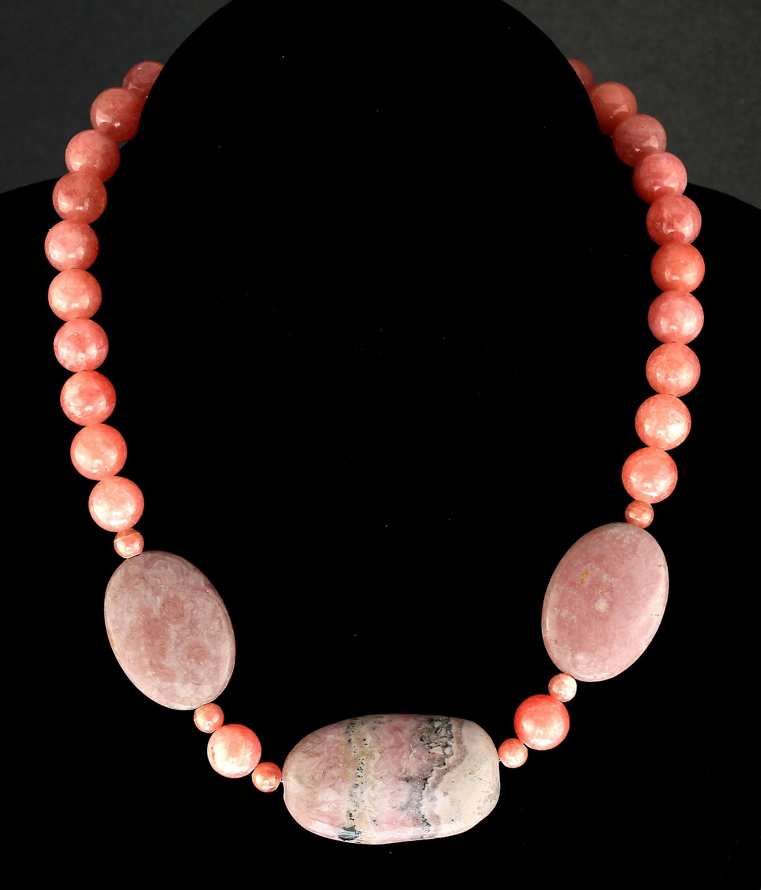 Unique and elegant Rhodochrosite and pinky/peach Agate choker necklace.  As a one of a kind necklace this necklace features three gorgeous Argentinian Rhodochrosite tablets and dyed matching Agate.  It is secured with an expandable silver plate