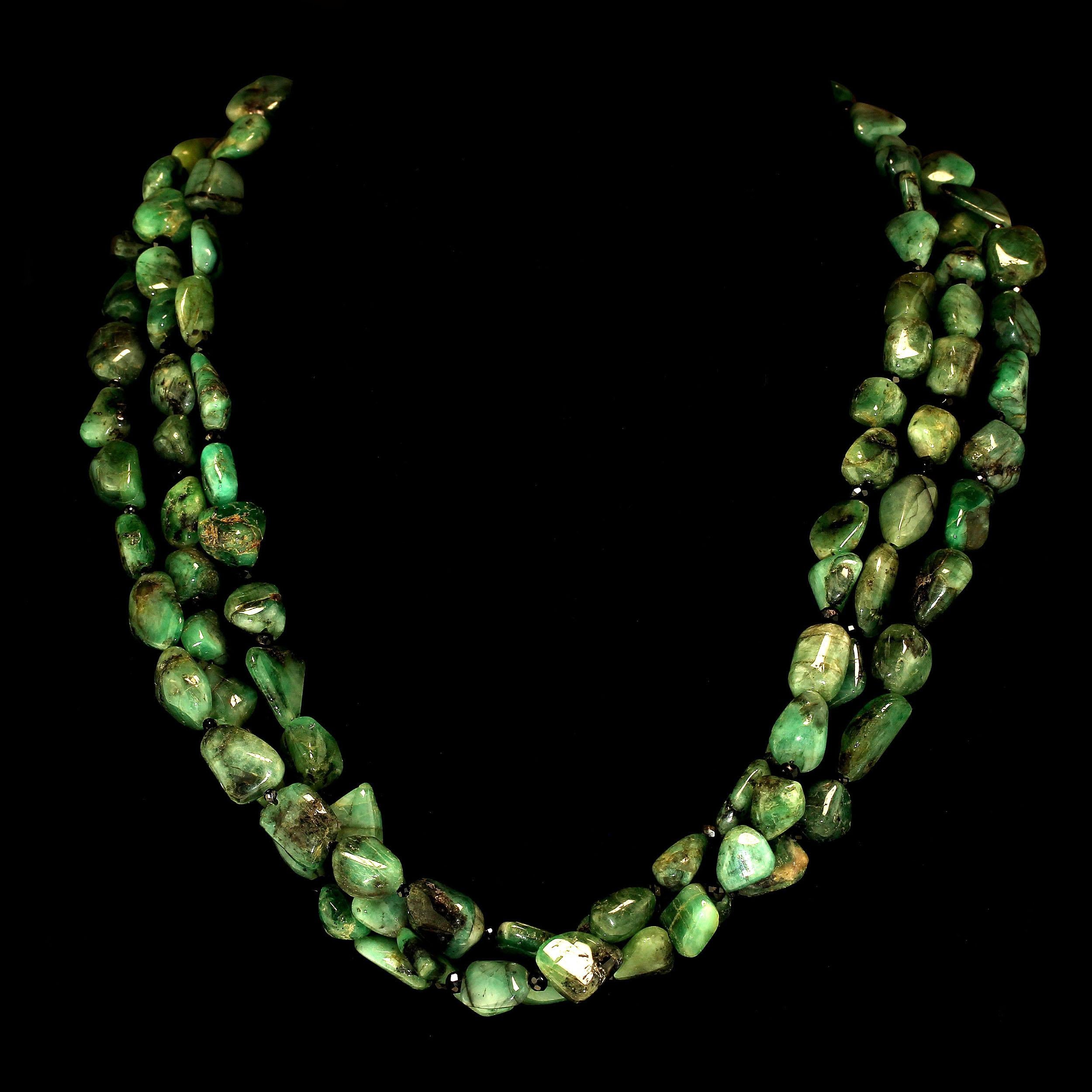 Handmade, elegant three strand Emerald in matrix nugget necklace.  This Gemjunky unique 19 inch necklace is three strands of highly polished Emerald nuggets accented with sparkling faceted black Spinel. These lovely nuggets are complementary to all
