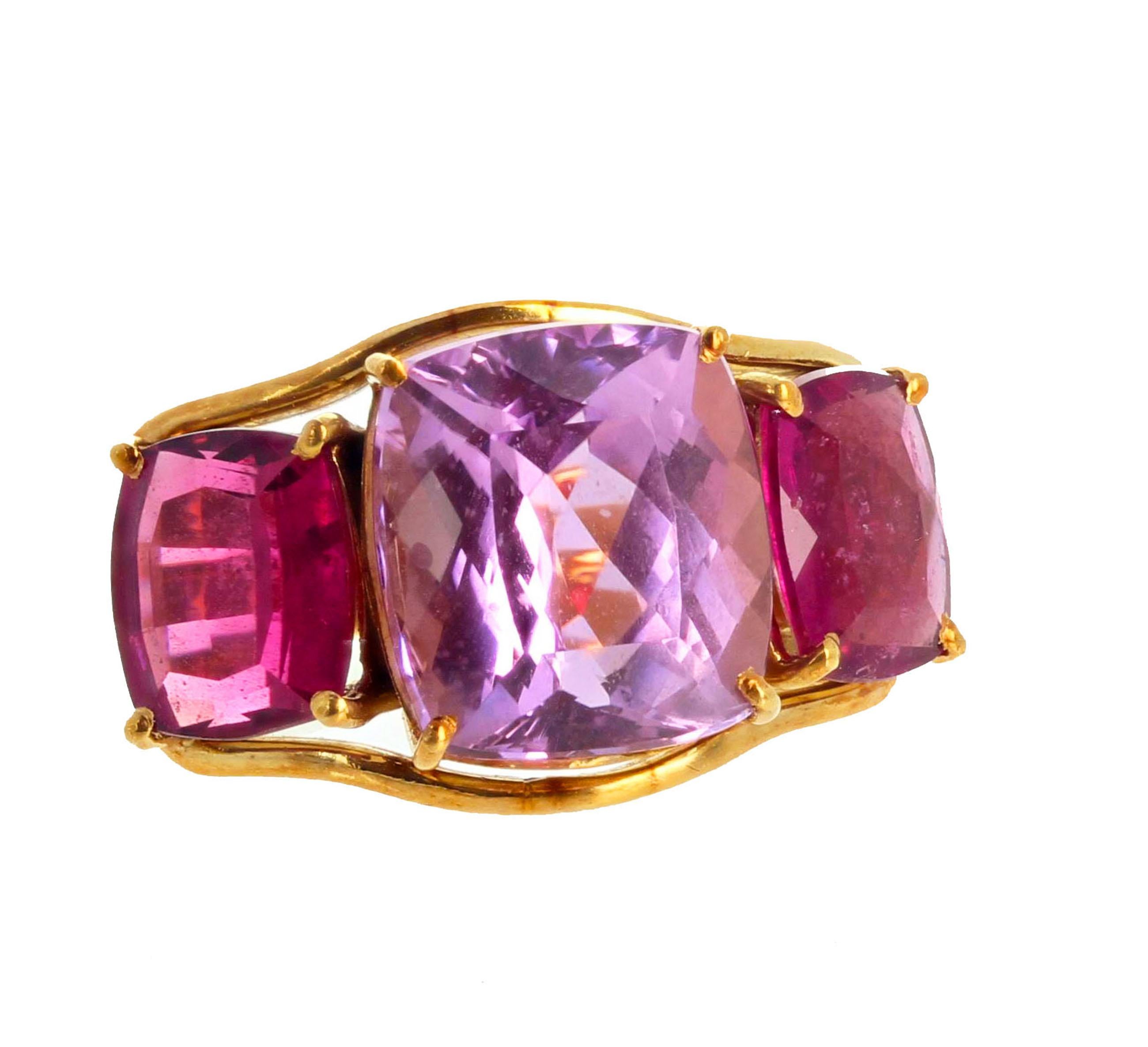 Glittering intense natural pink 8.85 carat Kunzite enhanced with 4.5 carats of pinky red natural Tourmalines set in 18kt yellow gold ring size 7 (sizable for free).  This is truly beautiful.