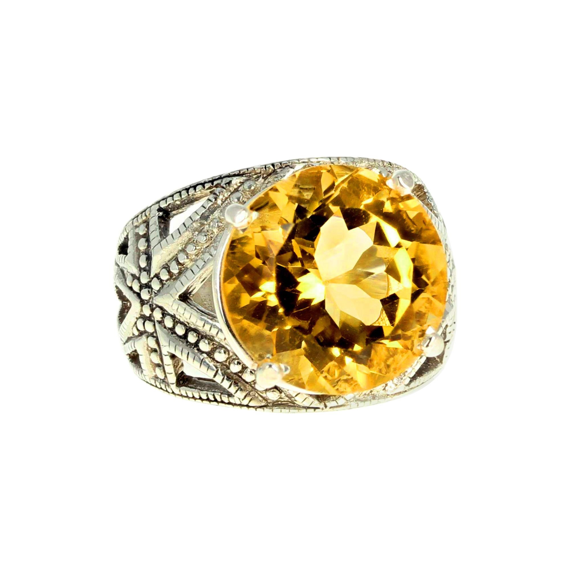 This brilliantly glittering 9.1 carat natural yellow Citrine is set in a sterling silver ring size 7 (sizable for free).  This fascinating beautiful special cut make it glitter more than most gemstones.  