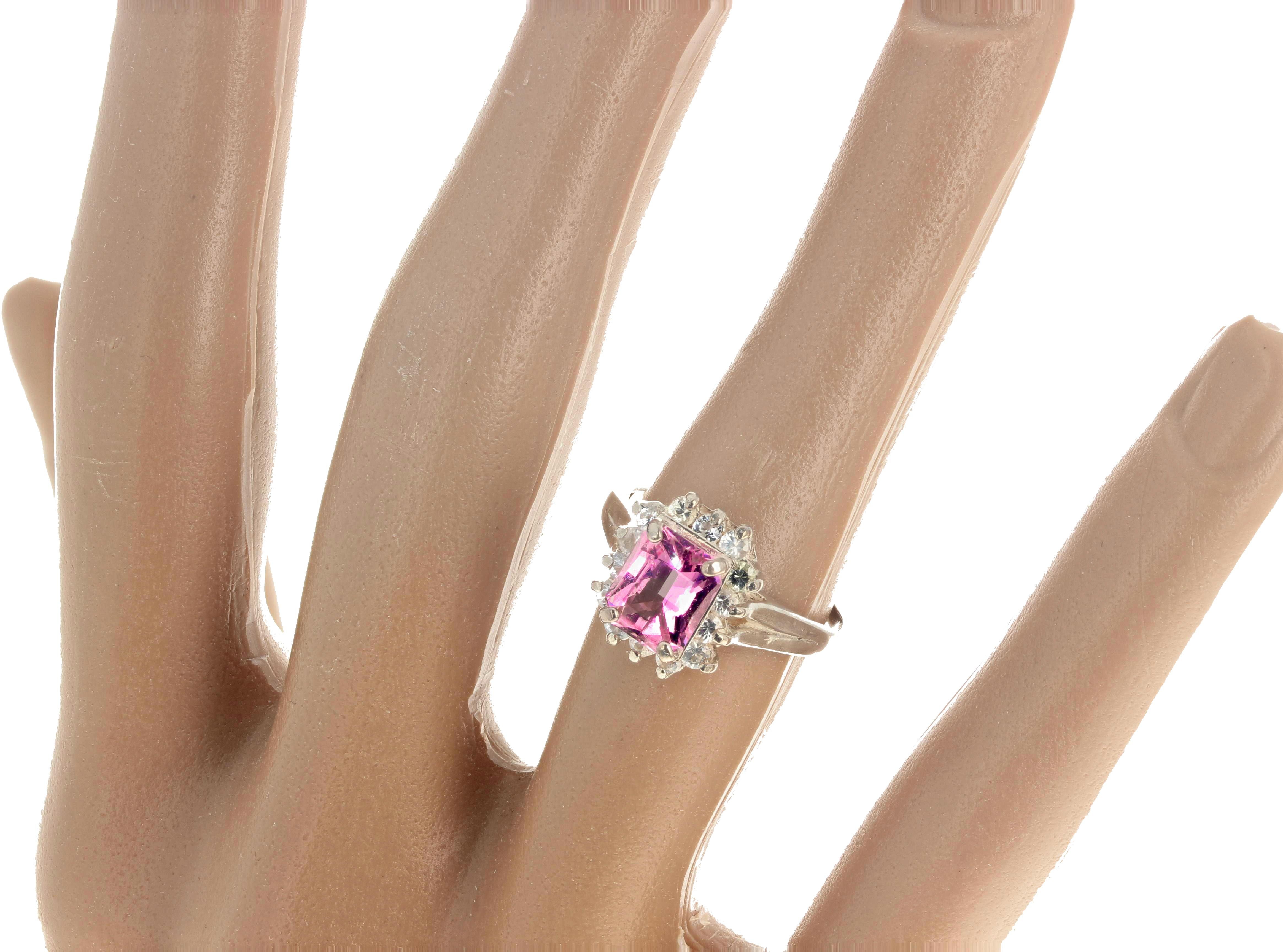 This beautiful 1 Carat Pink Tourmaline (7.6mm x 6.4 mm) is surrounded by beautiful glittering natural little white Sapphires set in this sterling silver ring size 7 (sizable for free). 