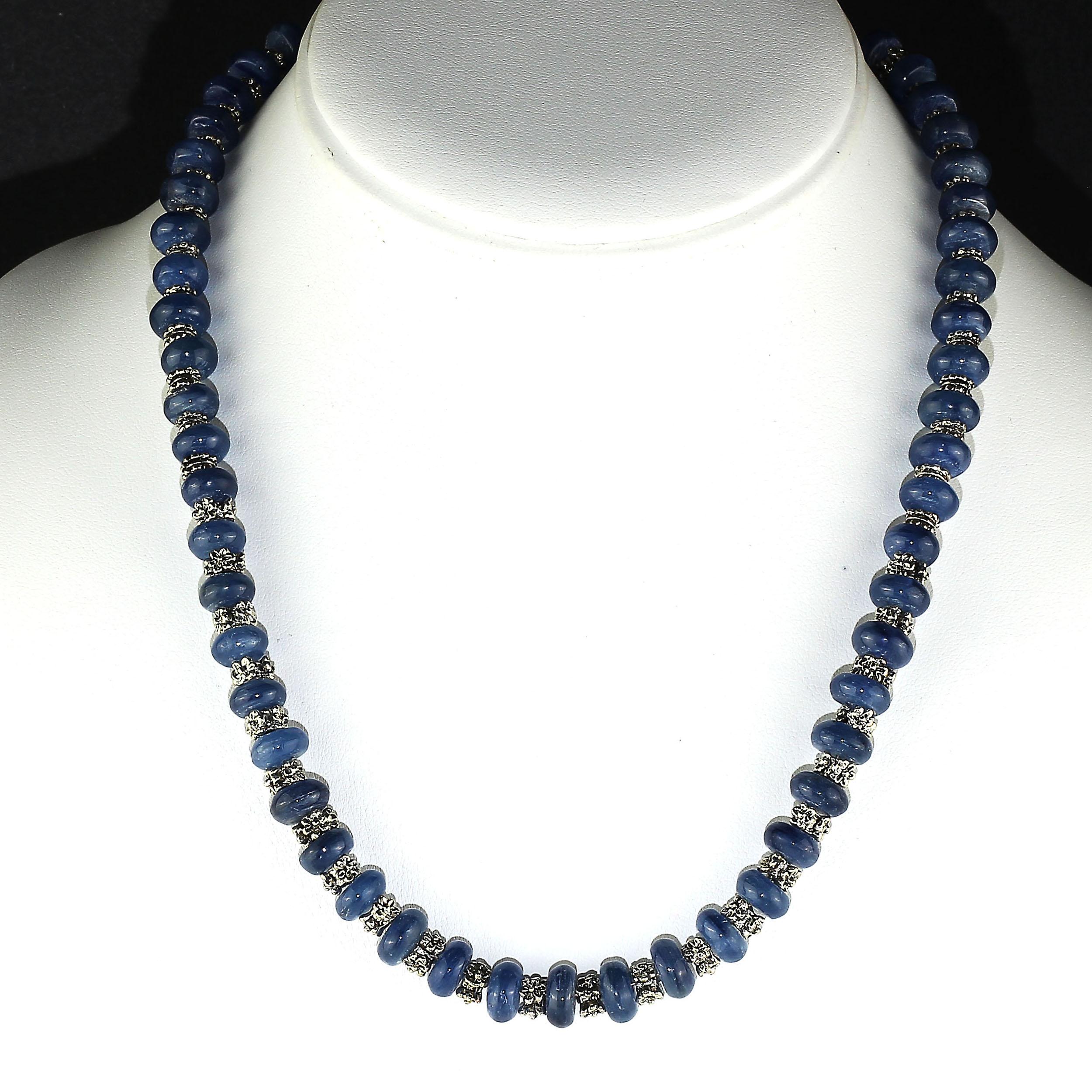 Necklace of Glistening Blue Kyanite rondelles, 9-10 MM, alternating with ornate silver Bali beads and finished with a Sterling Silver Celtic hook and eye. This unique 19 inch necklace is created in one of our most favorite colors and gemstones,