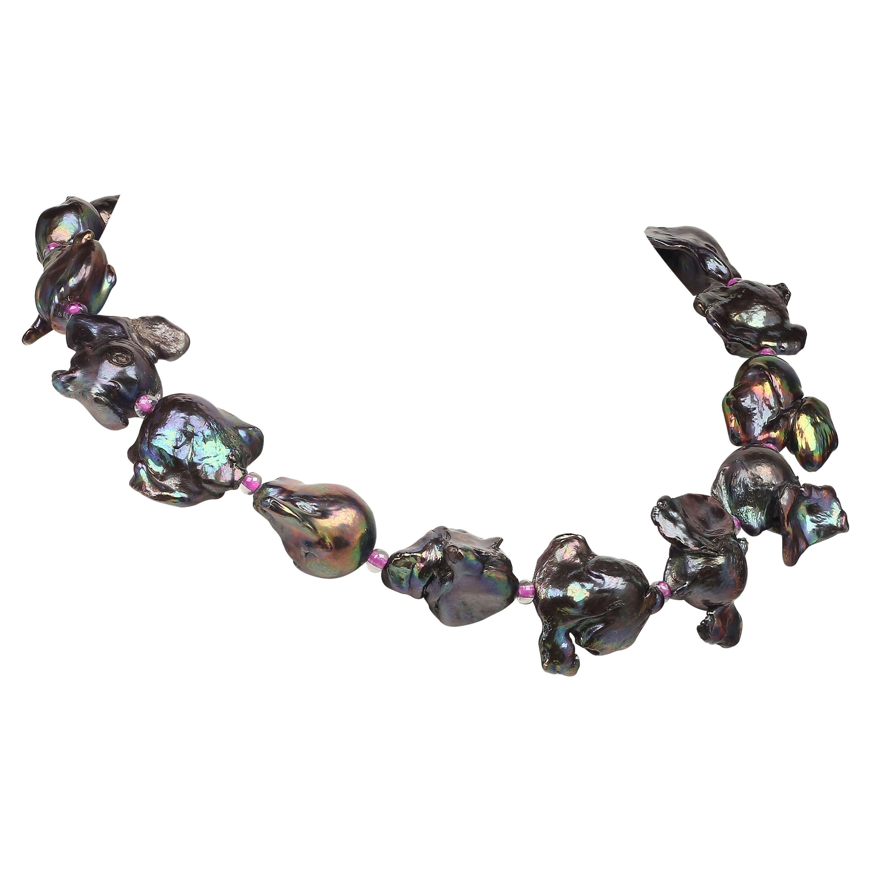 Because you deserve to wear Pearls

17 Inch Choker necklace of iridescent, purple Fireball Pearls.  The Fireballs have lovely tails just as you would see on a fireball shooting star as it crosses the sky, hence, the name.  These gorgeous, unusual