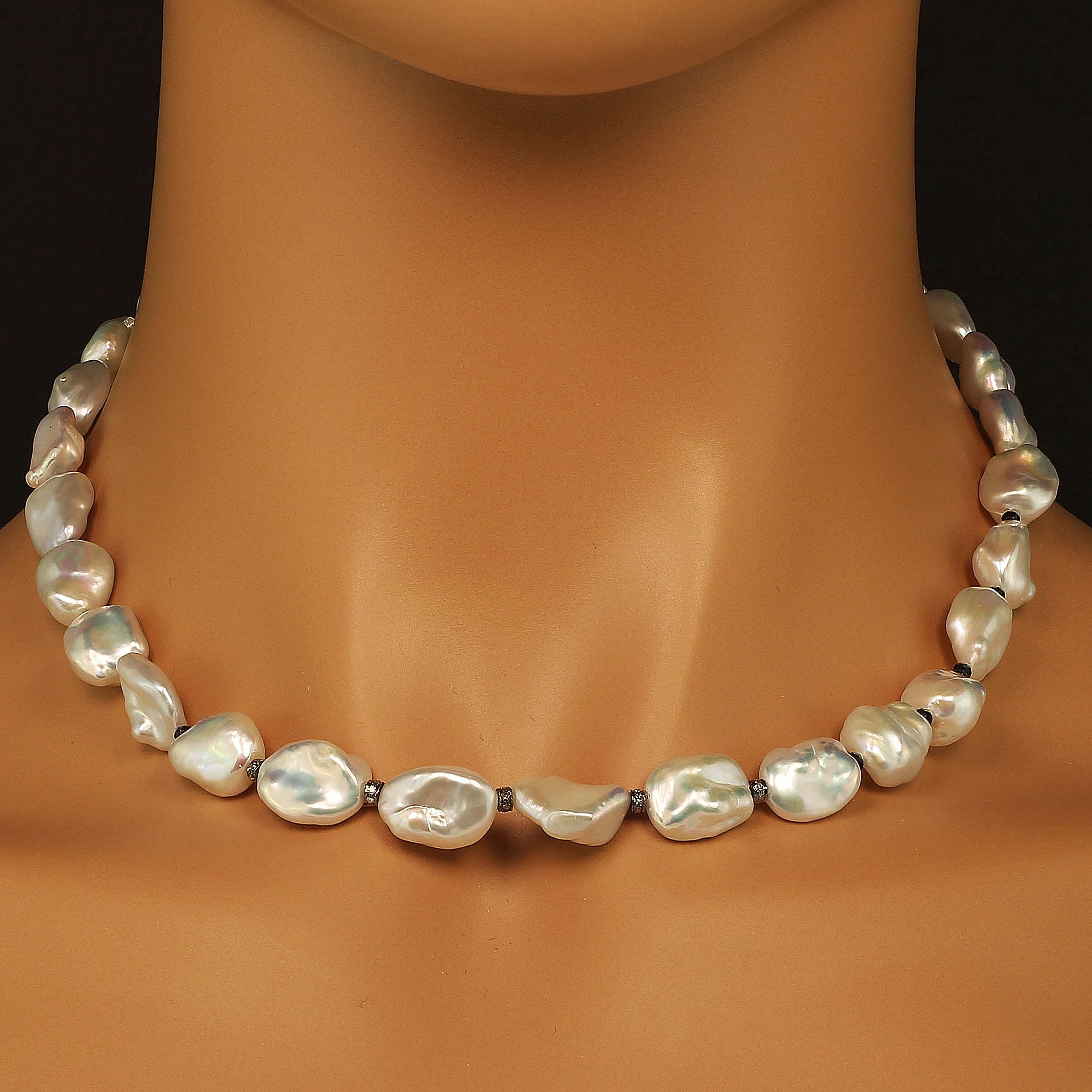 'Because you deserve to own Pearls'

Custom made necklace of silver iridescent Baroque Freshwater Pearls with Diamond accented Rondelles. These gorgeous iridescent pearls flash pinks and yellows and have a wonderful luster.  These pearls are from a
