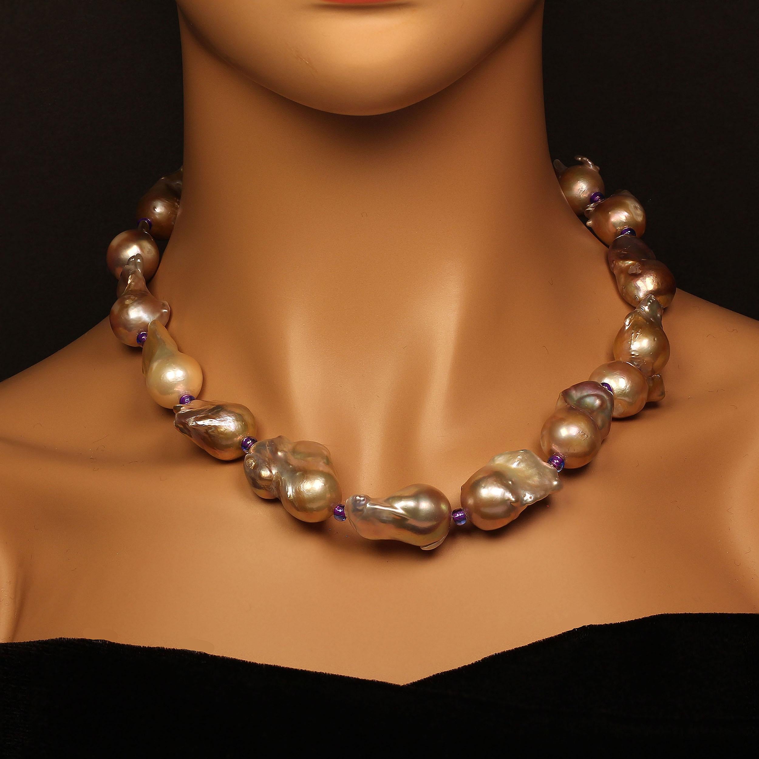 'Nothing gives the luxury of Pearls. Keep them in mind.'  Diana Vreeland 

Custom made necklace of Baroque Pearls in Very Freeform Shapes.  The undertone color is a lovely silver with lots of iridescence, purple, mauve, brown, pink, yellow.  These